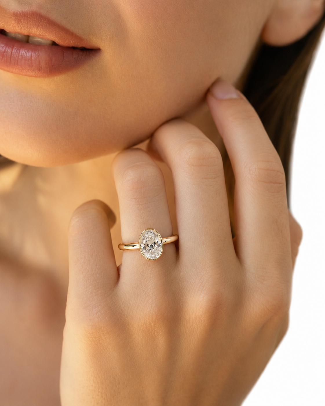 color_10K_YG, color_14K_YG &&Luxury oval moissanite ring featuring smooth bezel center stone design
