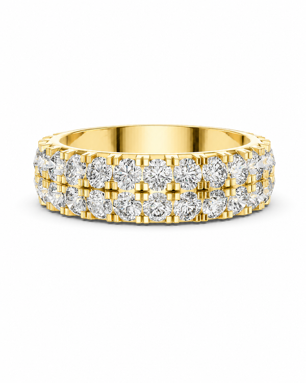 color_10K_YG, color_14K_YG &&	
A yellow gold eternity ring set with round brilliant-cut diamonds in a three-stone channel setting, shown on a clean white background.
