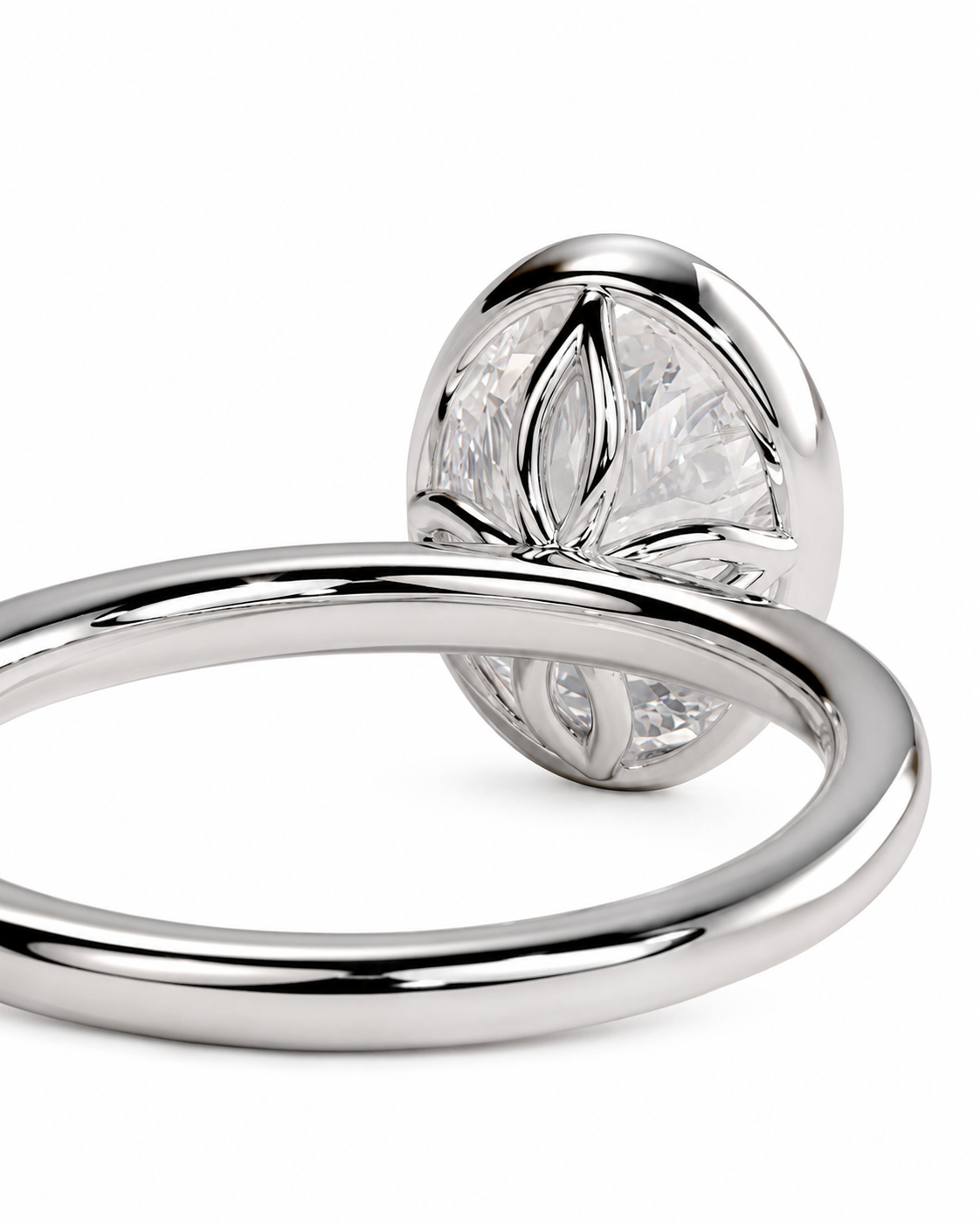 color_925_SIL,color_935_ARG,color_10K_WG, color_14K_WG &&A close-up studio shot of a silver-toned ring with a round bezel-set clear gemstone on a white background.