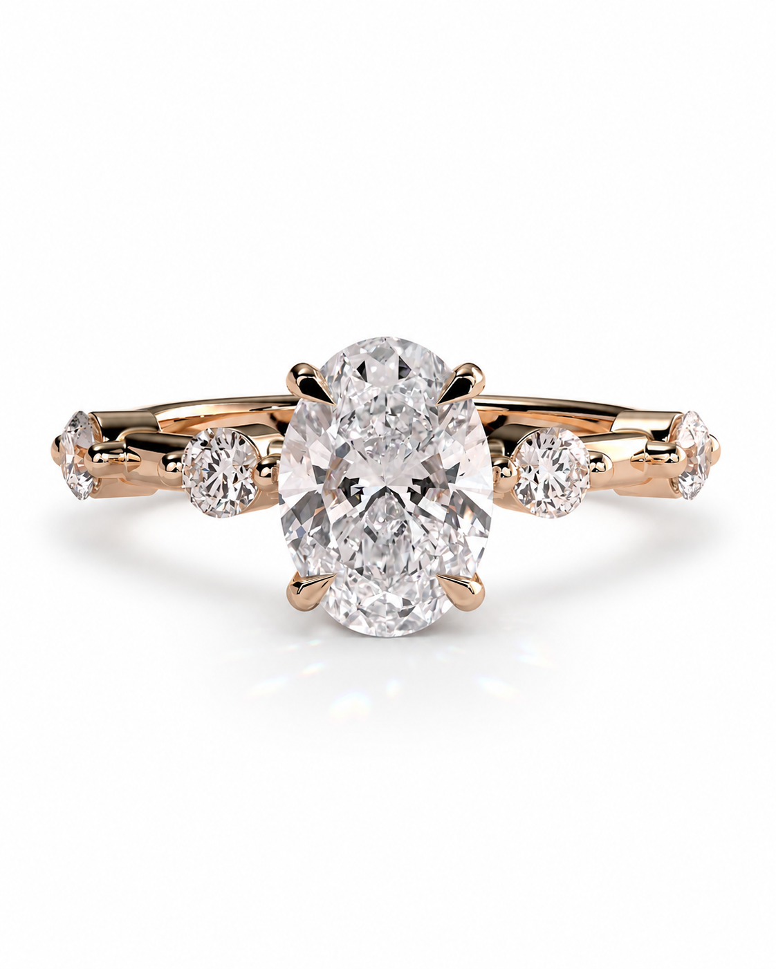 color_10K_RG, color_14K_RG &&A rose gold diamond ring with a large oval center stone and smaller round diamonds on the band, shown on a clean white background.