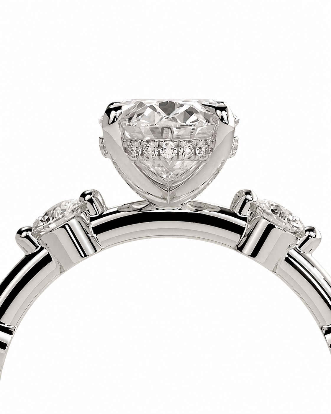 color_925_SIL,color_935_ARG,color_10K_WG, color_14K_WG &&A close-up studio shot of a silver-toned ring featuring a large heart-shaped diamond in a prong setting, with smaller diamonds along the band, on a plain white background.