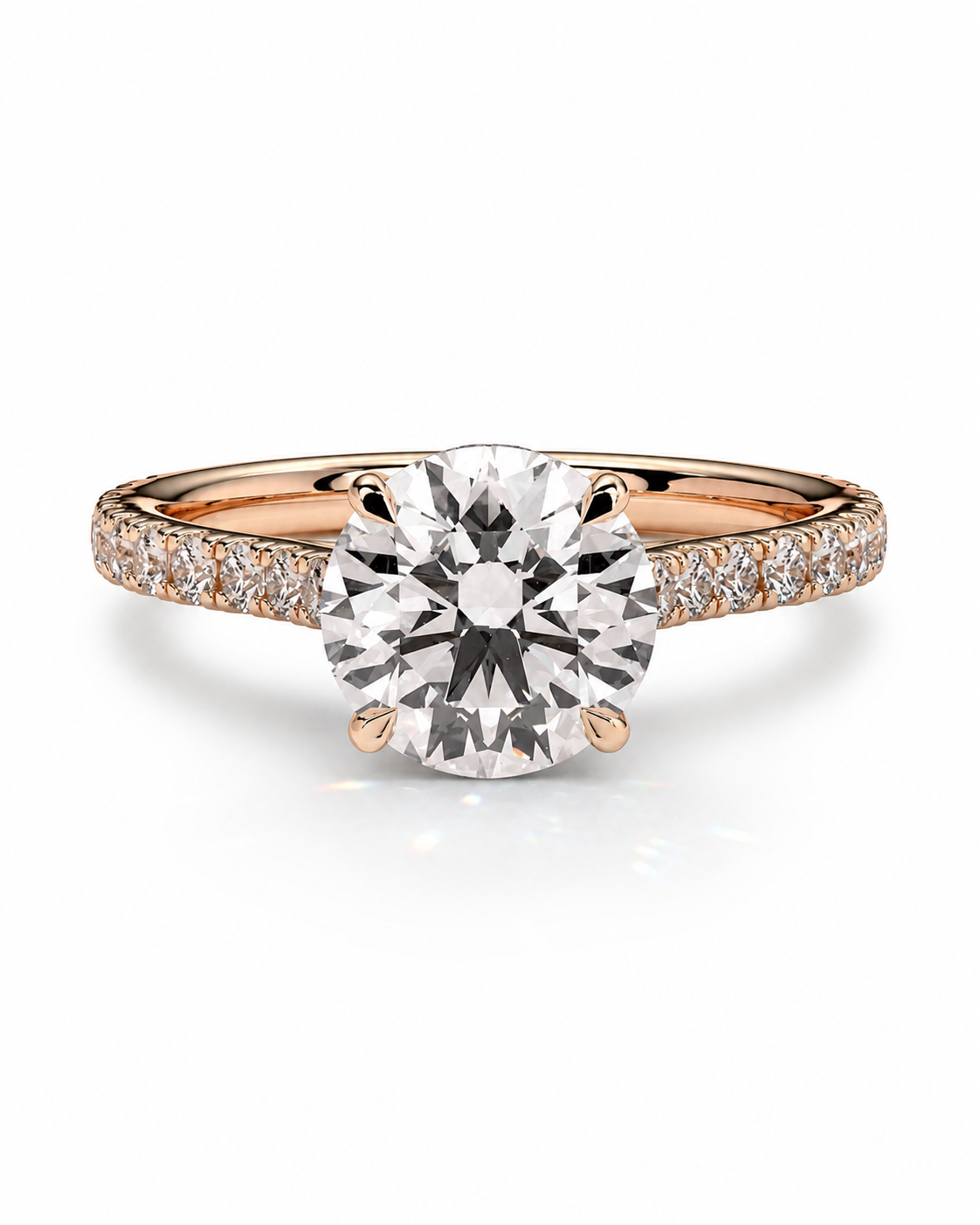 color_10K_RG, color_14K_RG &&A rose gold engagement ring featuring a large round-cut center stone in a six-prong setting, with a pave band accented by small round stones, shown on a clean white background.