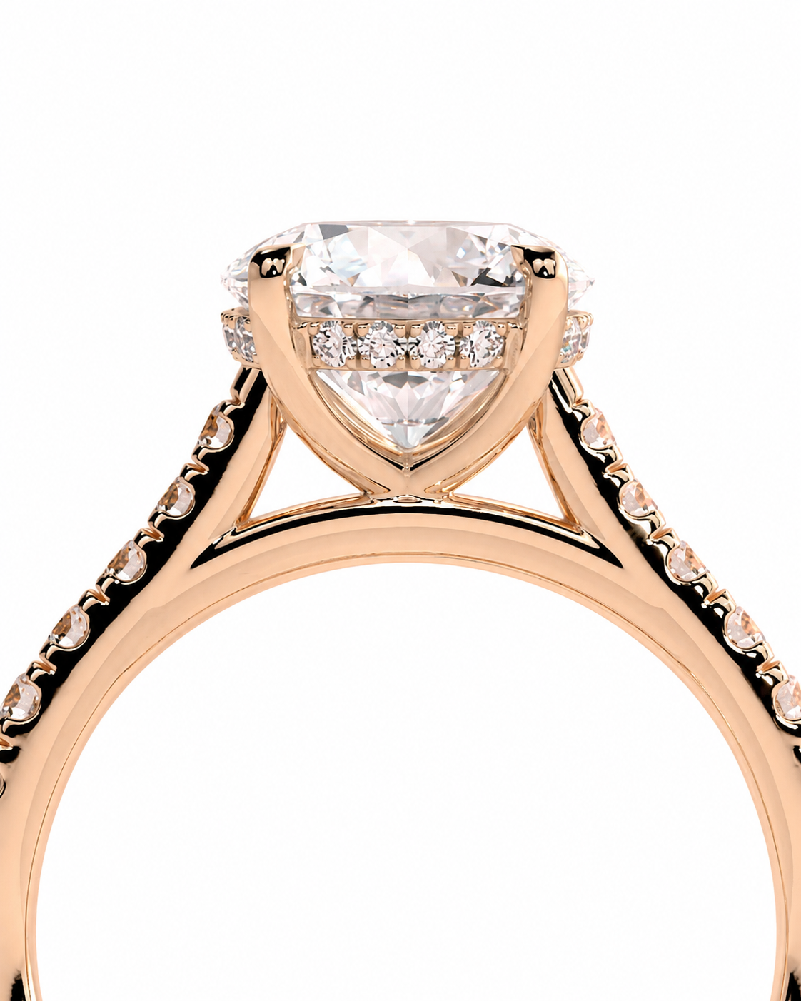 color_10K_RG, color_14K_RG &&Rose gold diamond ring with a large pear-cut center stone and a halo of small diamonds, shown in a close-up studio shot on a white background.