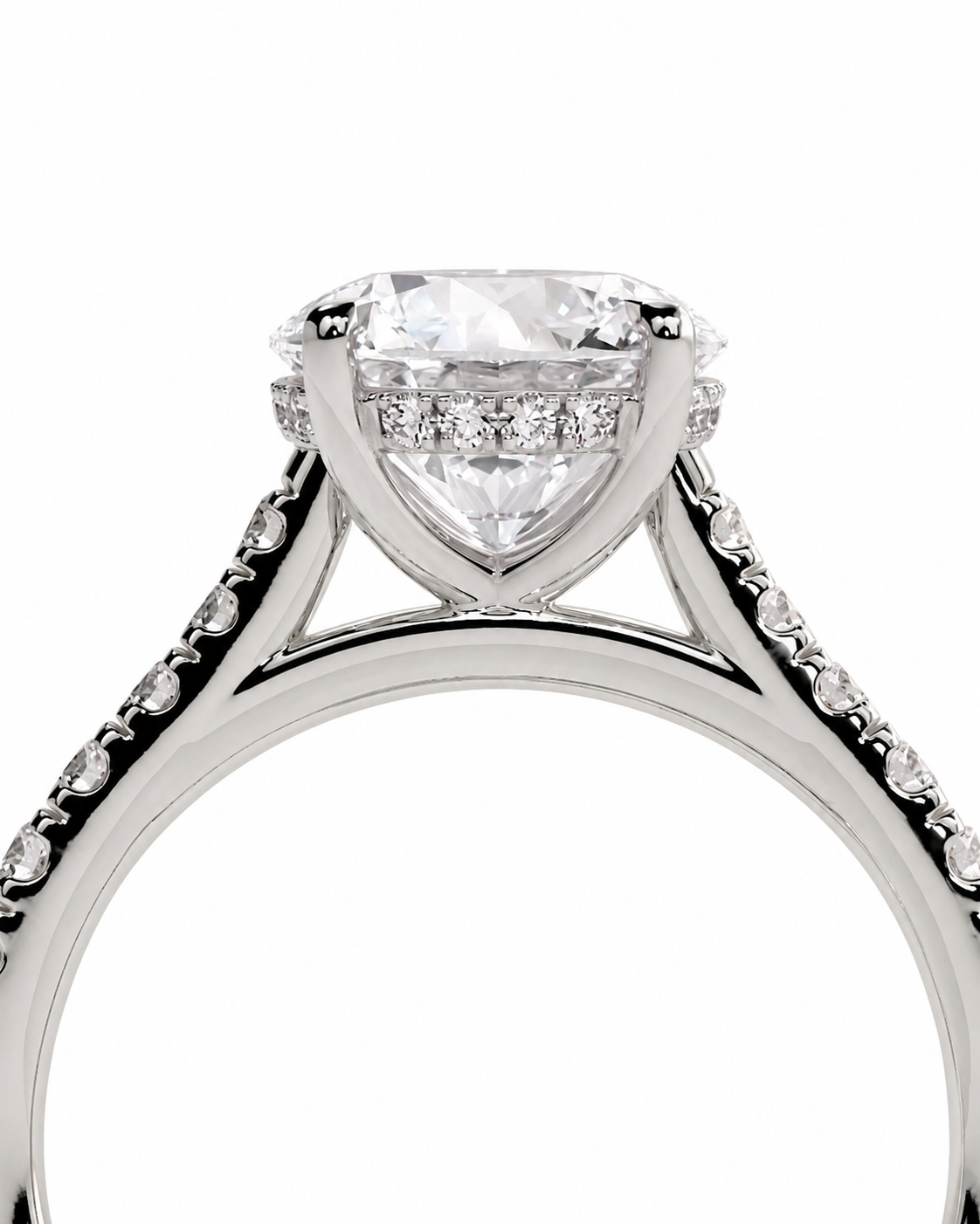 color_925_SIL,color_935_ARG,color_10K_WG, color_14K_WG &&A close-up studio shot of a silver-toned diamond ring featuring a large heart-shaped center stone and smaller diamonds along the shoulders, set against a plain white background.