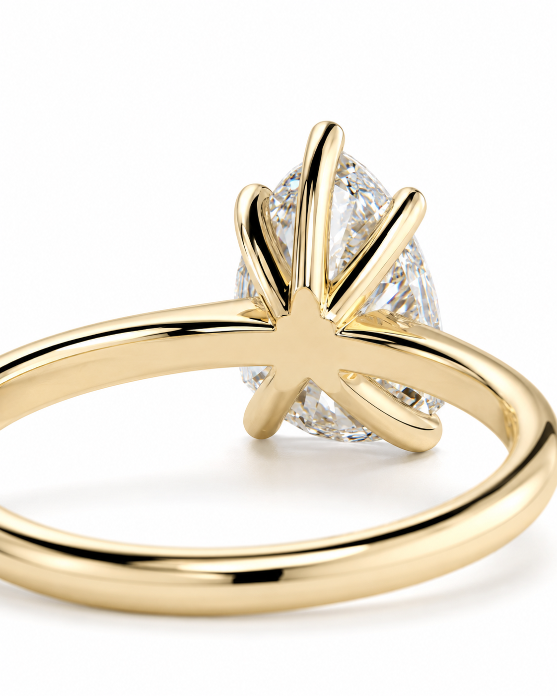 color_10K_YG, color_14K_YG &&Side profile view of pear moissanite ring showing raised setting detail
