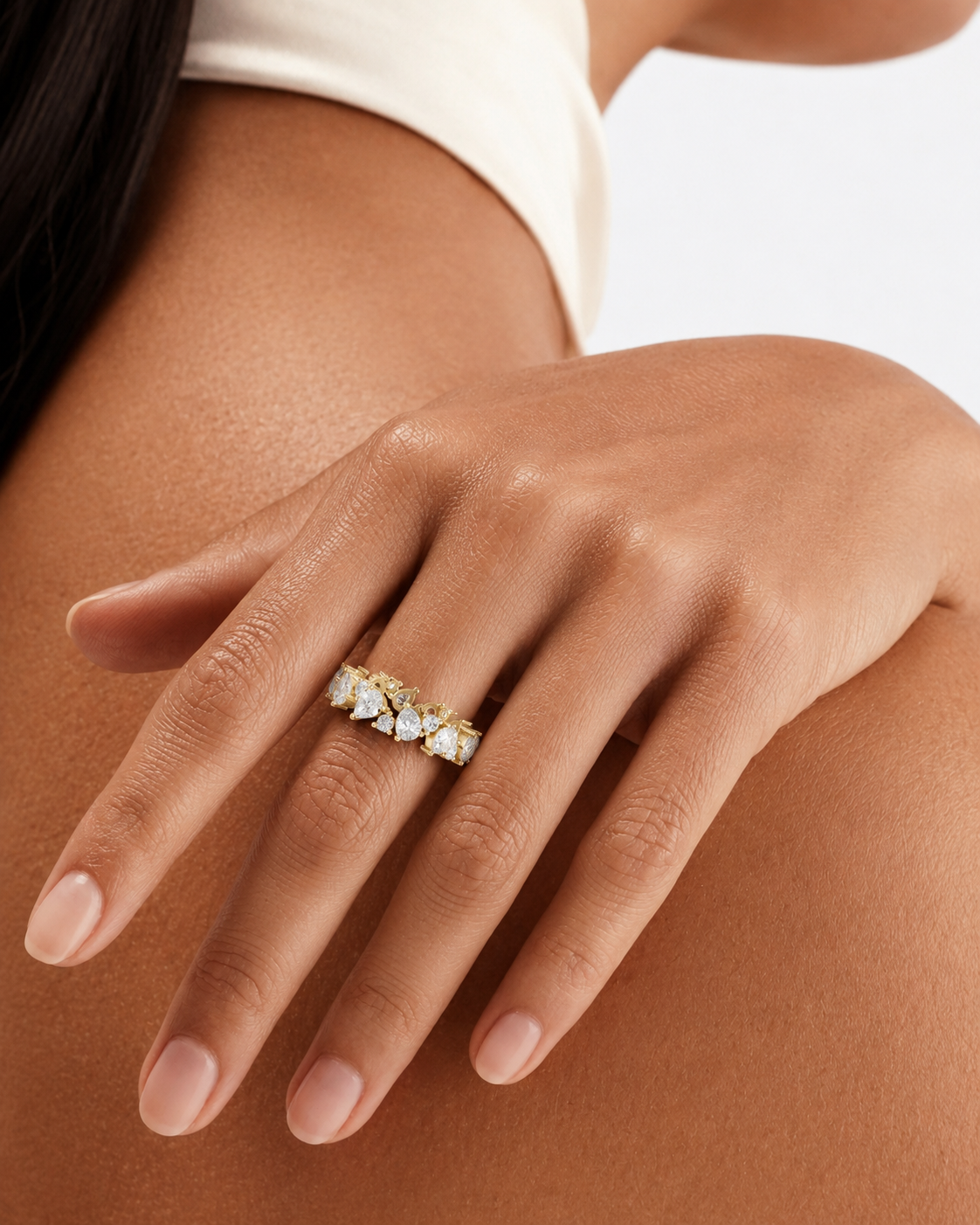color_10K_YG, color_14K_YG &&	
Wedding band for women with alternating pear-cut and round moissanite stones.