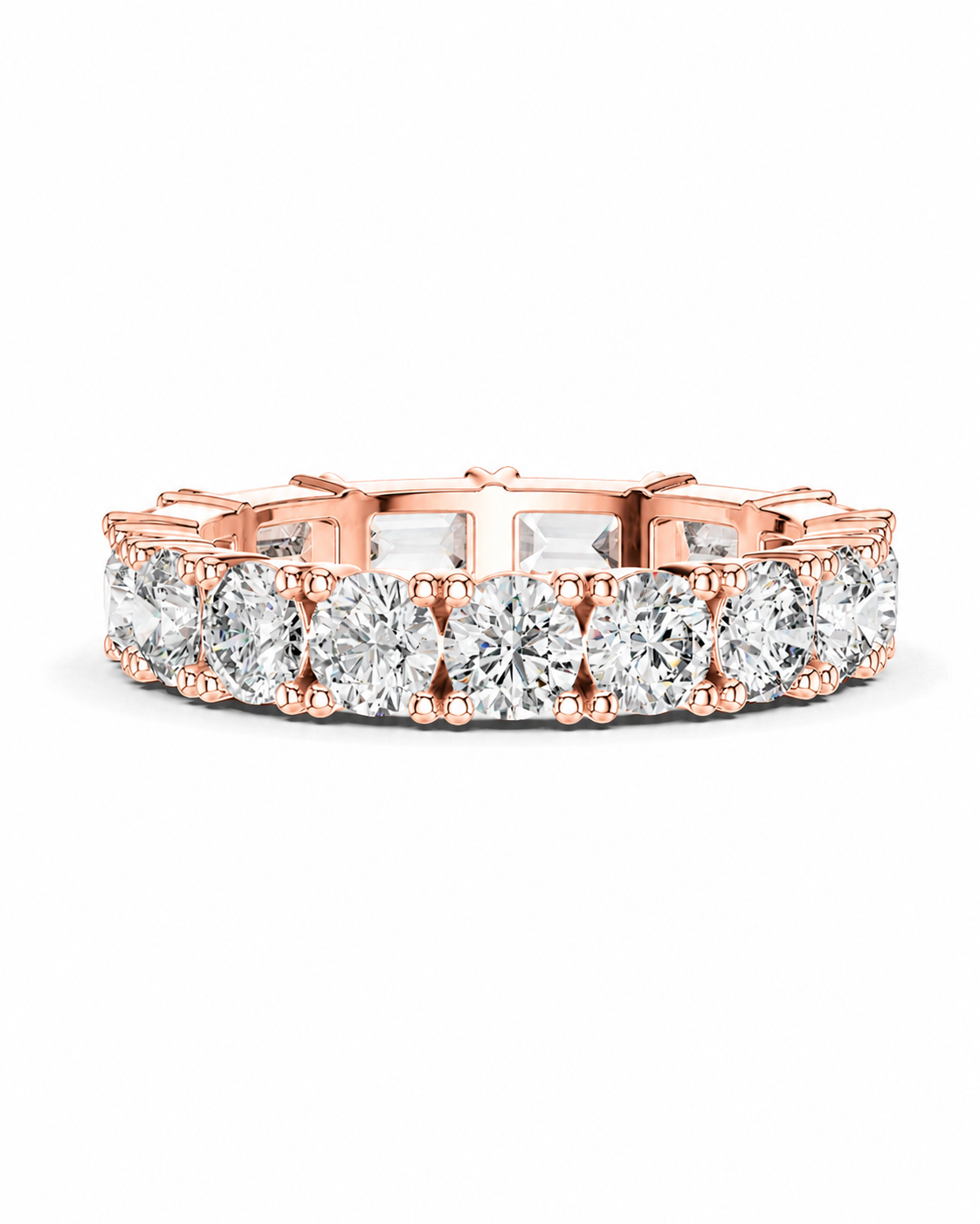 color_10K_RG, color_14K_RG &&	A rose gold eternity band ring featuring a continuous row of round brilliant-cut diamonds in a prong setting, shown against a clean white background.