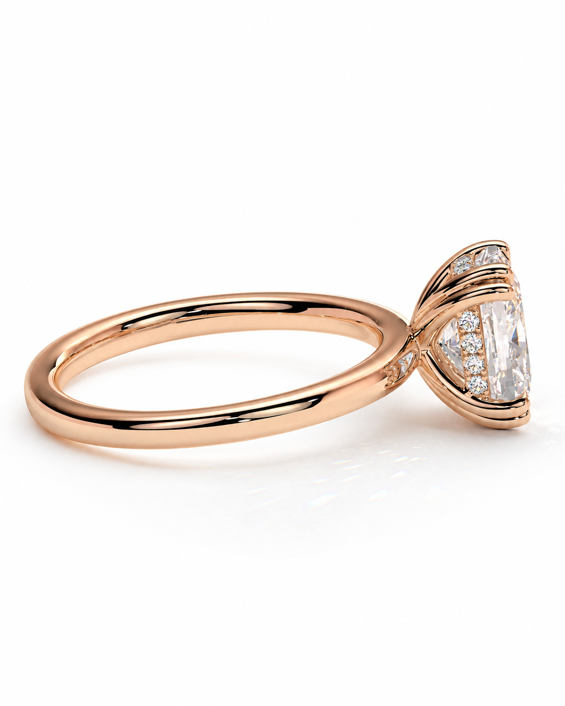 color_10K_RG, color_14K_RG &&A rose gold ring with a marquise-cut clear center stone and small pave accents, shown on a clean white background.