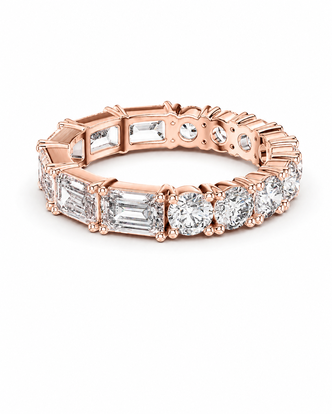 color_10K_RG, color_14K_RG &&	A rose gold eternity ring featuring alternating baguette and round-cut clear gemstones, presented on a clean white background.
