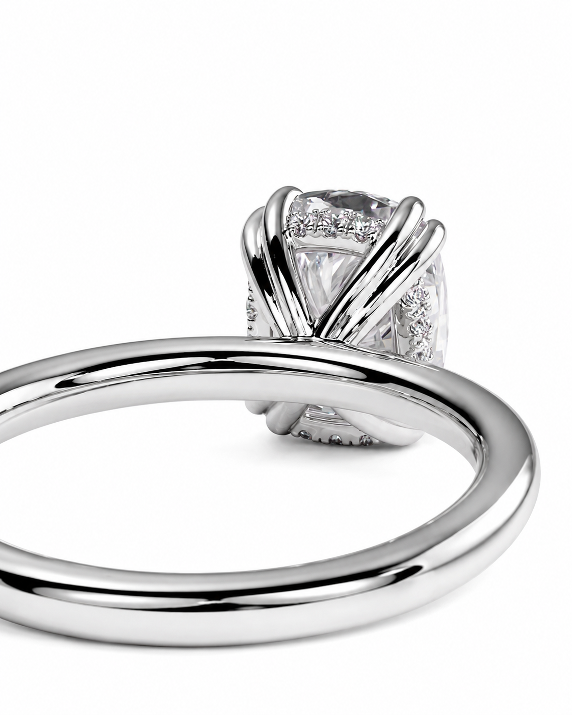 color_925_SIL,color_935_ARG,color_10K_WG, color_14K_WG &&A close-up studio shot of a silver-toned ring with a large clear center stone and smaller accent stones, shown against a plain white background.