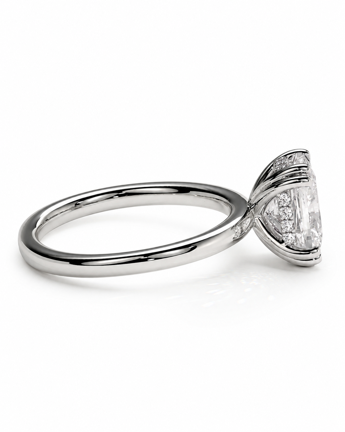 color_925_SIL,color_935_ARG,color_10K_WG, color_14K_WG &&A silver-toned diamond ring with a large clear round-cut center stone and smaller accent stones in a prong setting, shown on a clean white background.
