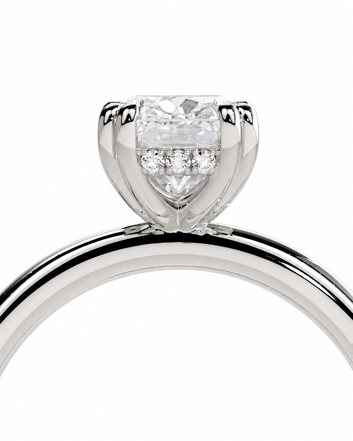 color_925_SIL,color_935_ARG,color_10K_WG, color_14K_WG &&A close-up studio shot of a silver-toned solitaire engagement ring with a clear rectangular center stone and small side stones, shown against a plain white background.