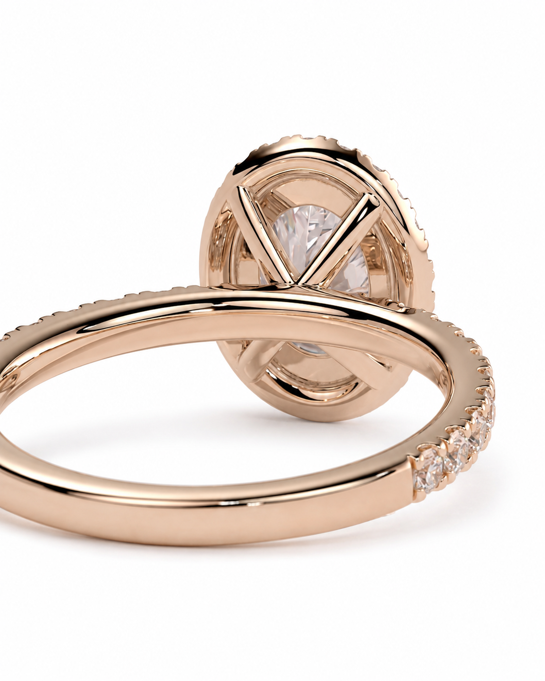 color_10K_RG, color_14K_RG &&Rose gold ring with a round bezel-set clear gemstone and a shank decorated with small pave-set diamonds, shown on a white background.
