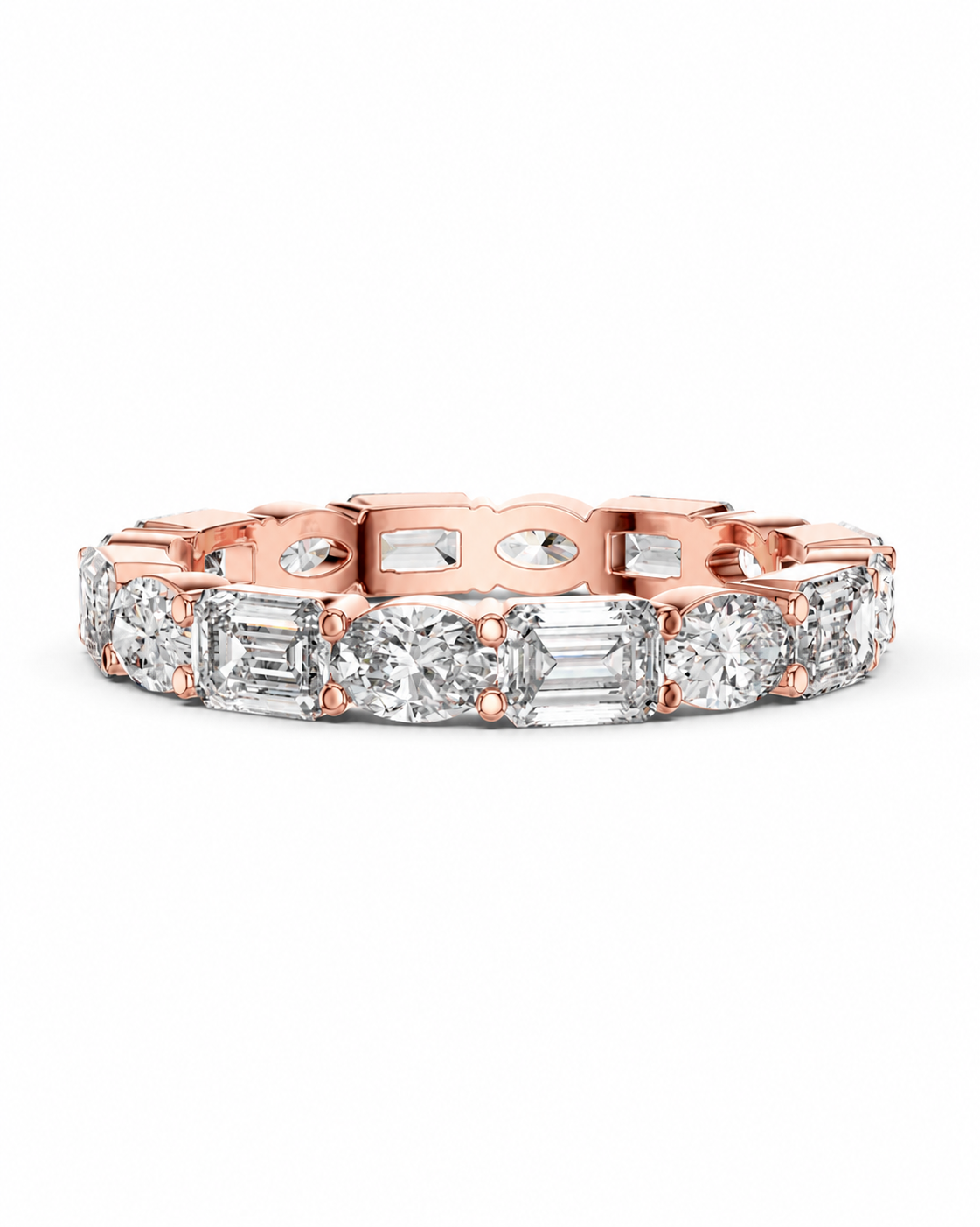 color_10K_RG, color_14K_RG &&	A rose gold tennis bracelet featuring round and baguette-cut clear diamonds, presented on a clean white background.