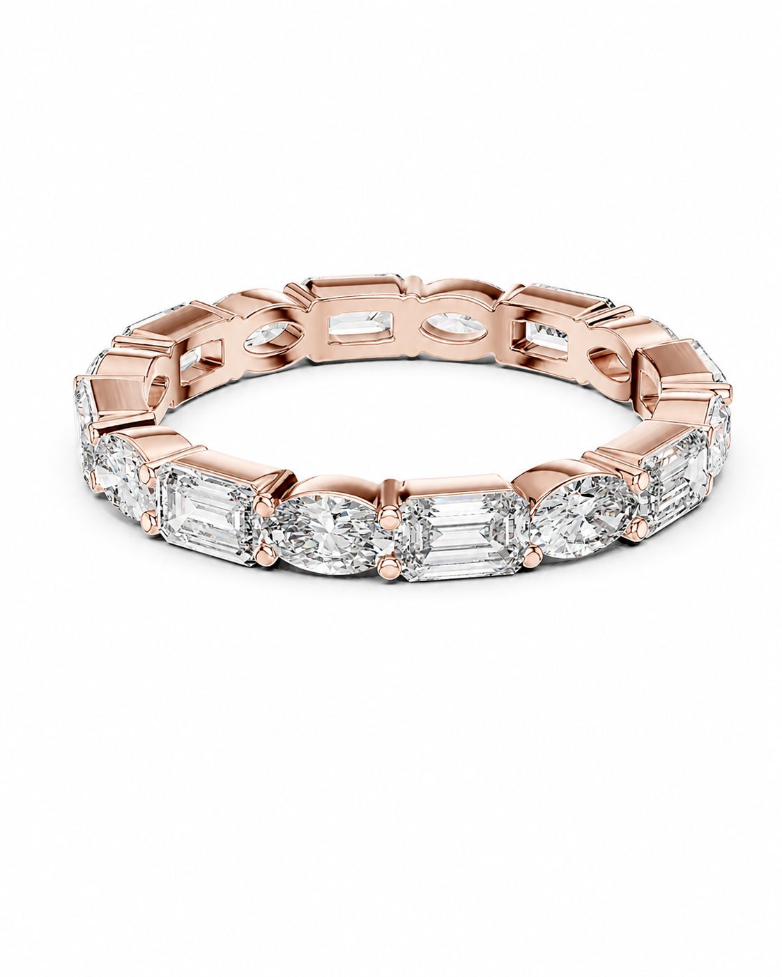 color_10K_RG, color_14K_RG &&	A rose gold eternity band featuring a continuous row of clear baguette and oval-cut gemstones, shown on a clean white background.