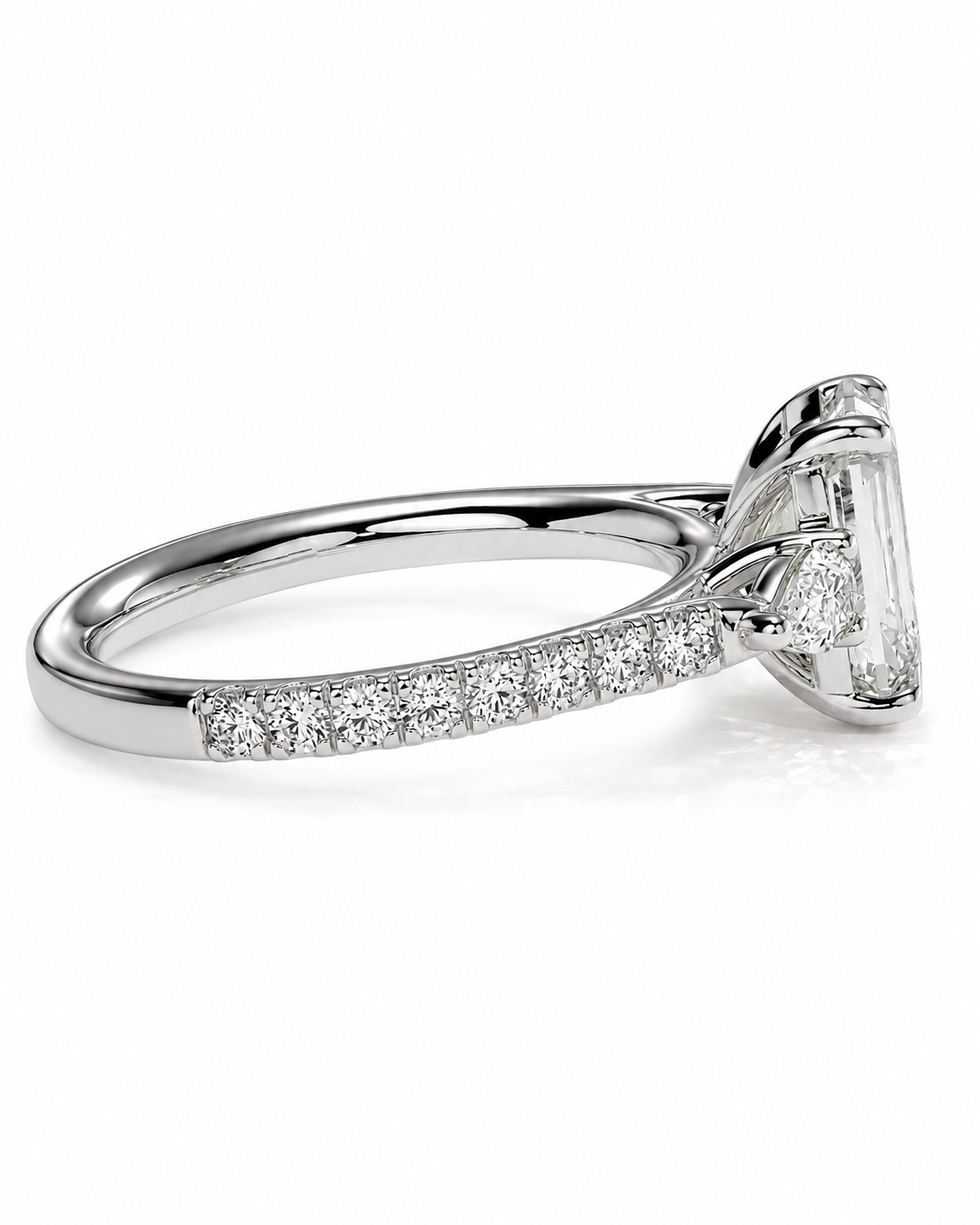 color_925_SIL,color_935_ARG,color_10K_WG, color_14K_WG &&A silver-toned diamond engagement ring featuring a large rectangular emerald-cut center stone and a pave band with smaller round diamonds, shown on a clean white background.