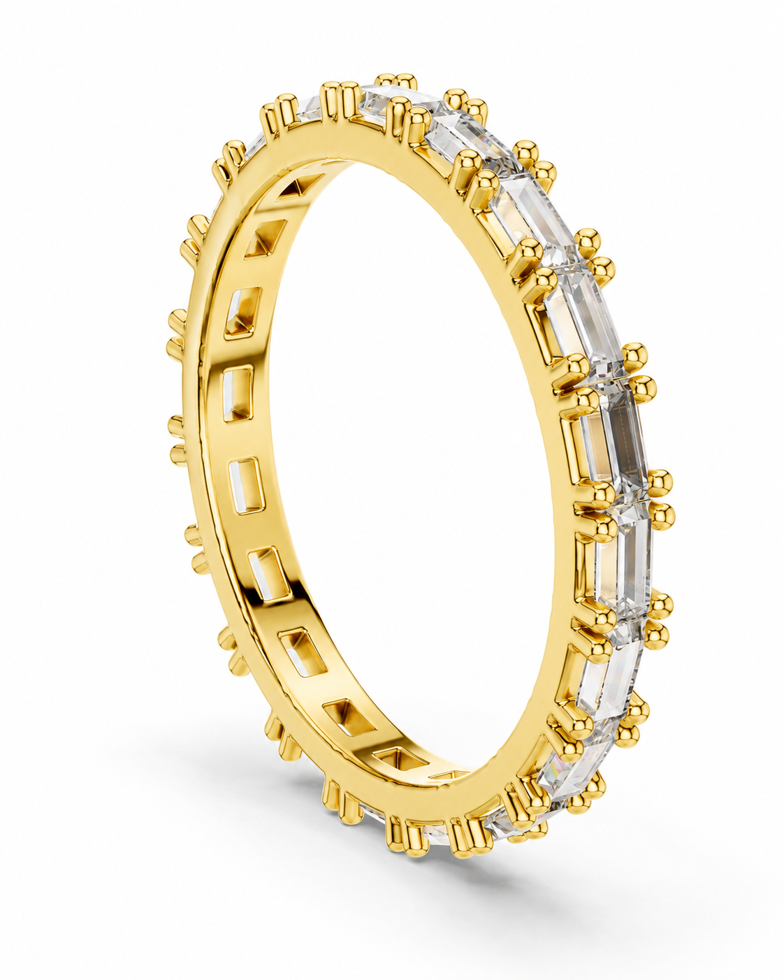 color_10K_YG, color_14K_YG &&	
A yellow gold eternity ring featuring a continuous channel setting of clear baguette-cut gemstones, shown at an angle on a clean white background.