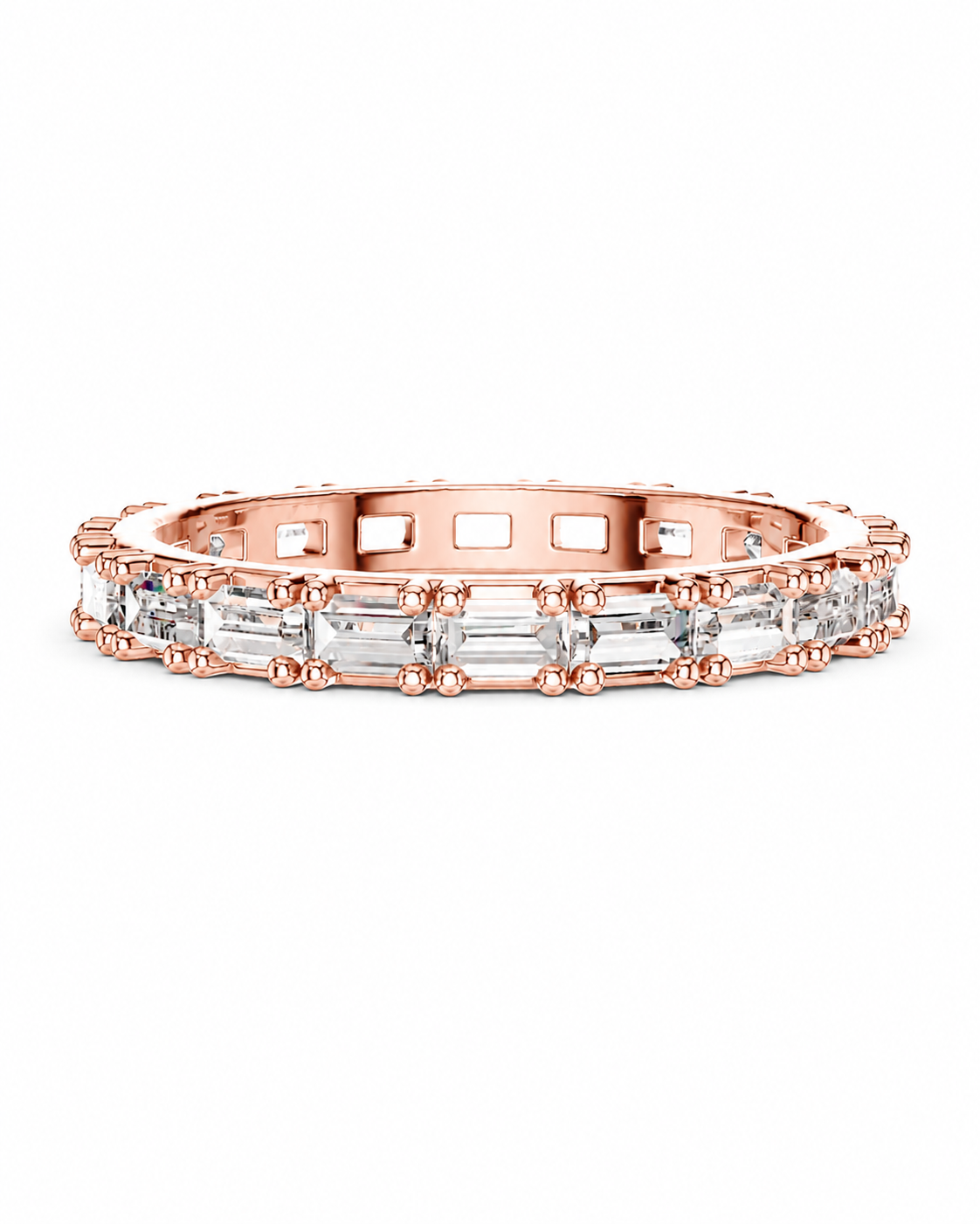 color_10K_RG, color_14K_RG &&	A rose gold eternity ring featuring a continuous channel setting of clear baguette-cut gemstones, shown against a plain white background.