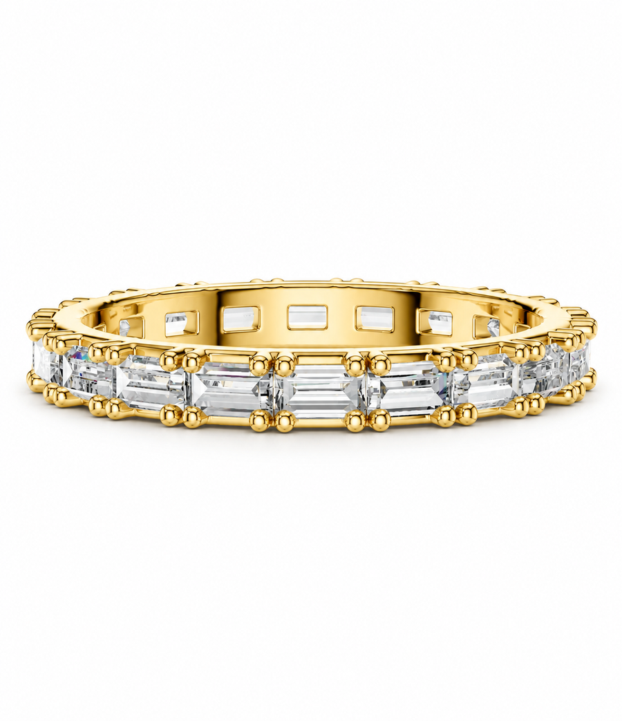 color_10K_YG, color_14K_YG &&	
A yellow gold eternity ring featuring a continuous row of baguette-cut clear gemstones in a beaded setting, shown against a plain white background.