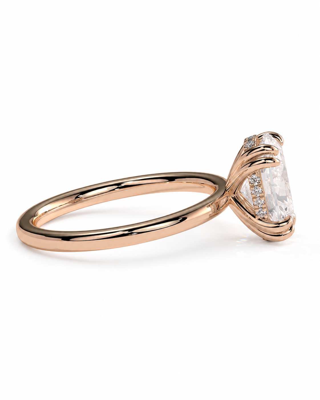 color_10K_RG, color_14K_RG &&A rose gold engagement ring featuring a marquise-cut center stone and small accent diamonds on a clean white background.