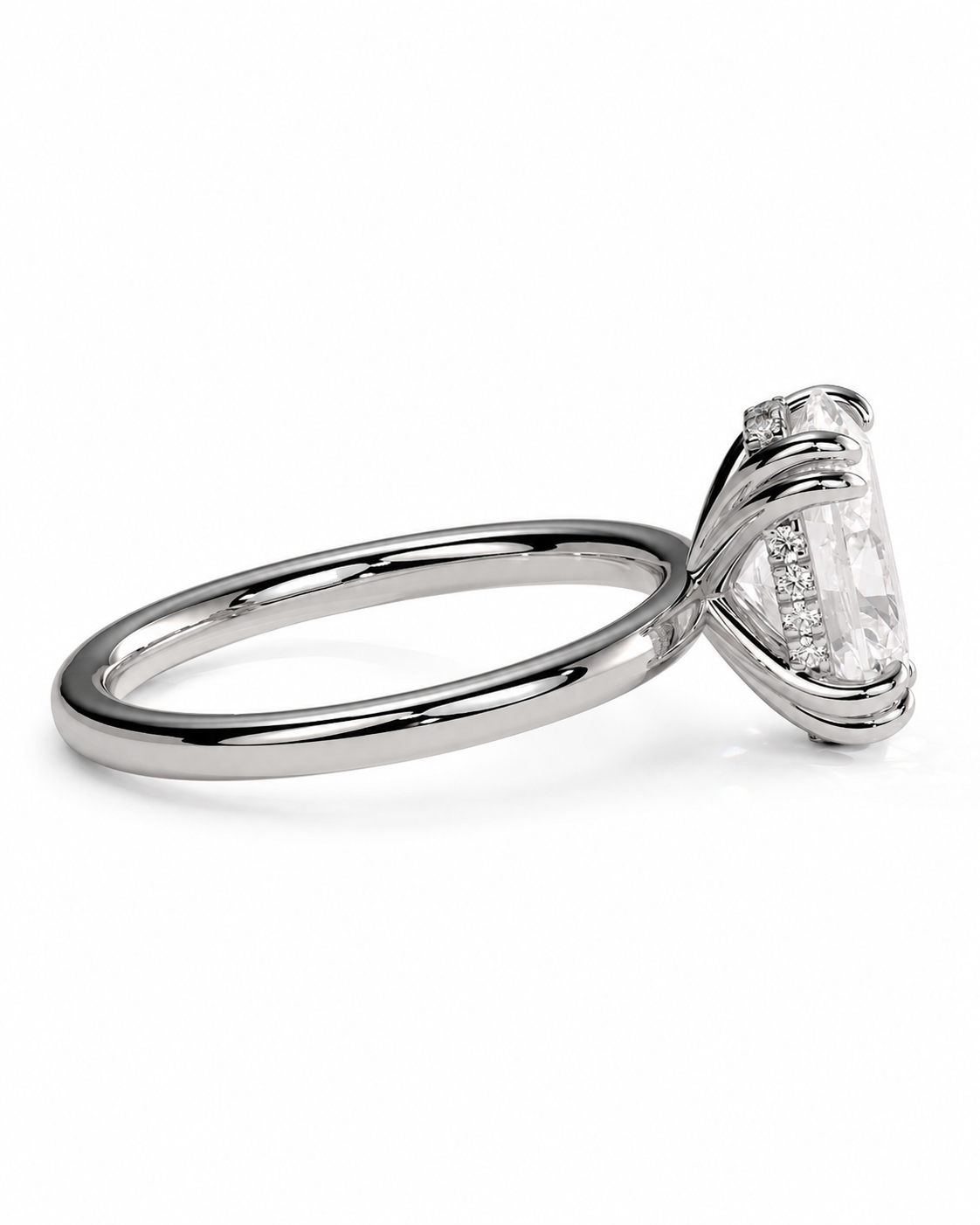 color_925_SIL,color_935_ARG,color_10K_WG, color_14K_WG &&A silver-toned solitaire engagement ring with a marquise-cut clear gemstone in a prong setting, shown on a clean white background.