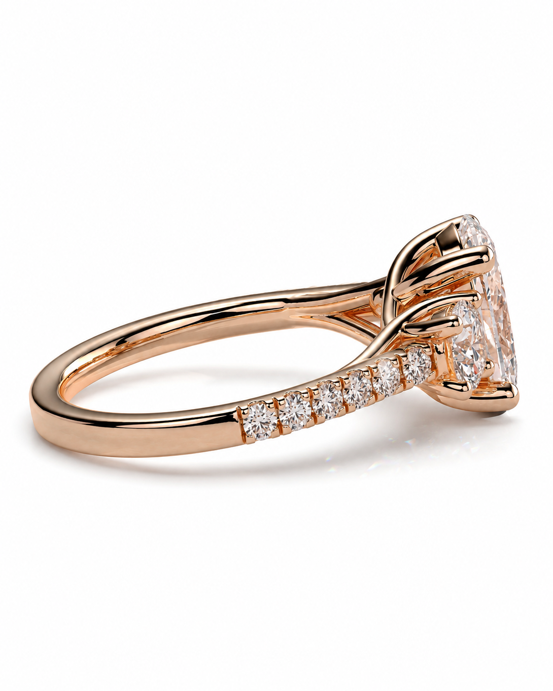 color_10K_RG, color_14K_RG &&Rose gold engagement ring with a large round-cut center stone and a pave band of small clear stones, shown on a white background.