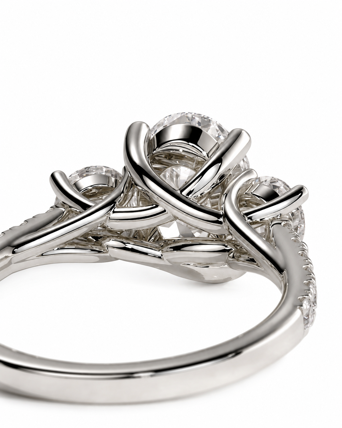 color_925_SIL,color_935_ARG,color_10K_WG, color_14K_WG &&A close-up studio shot of a silver-toned ring with a large round clear center stone and smaller surrounding stones, photographed on a clean white background.