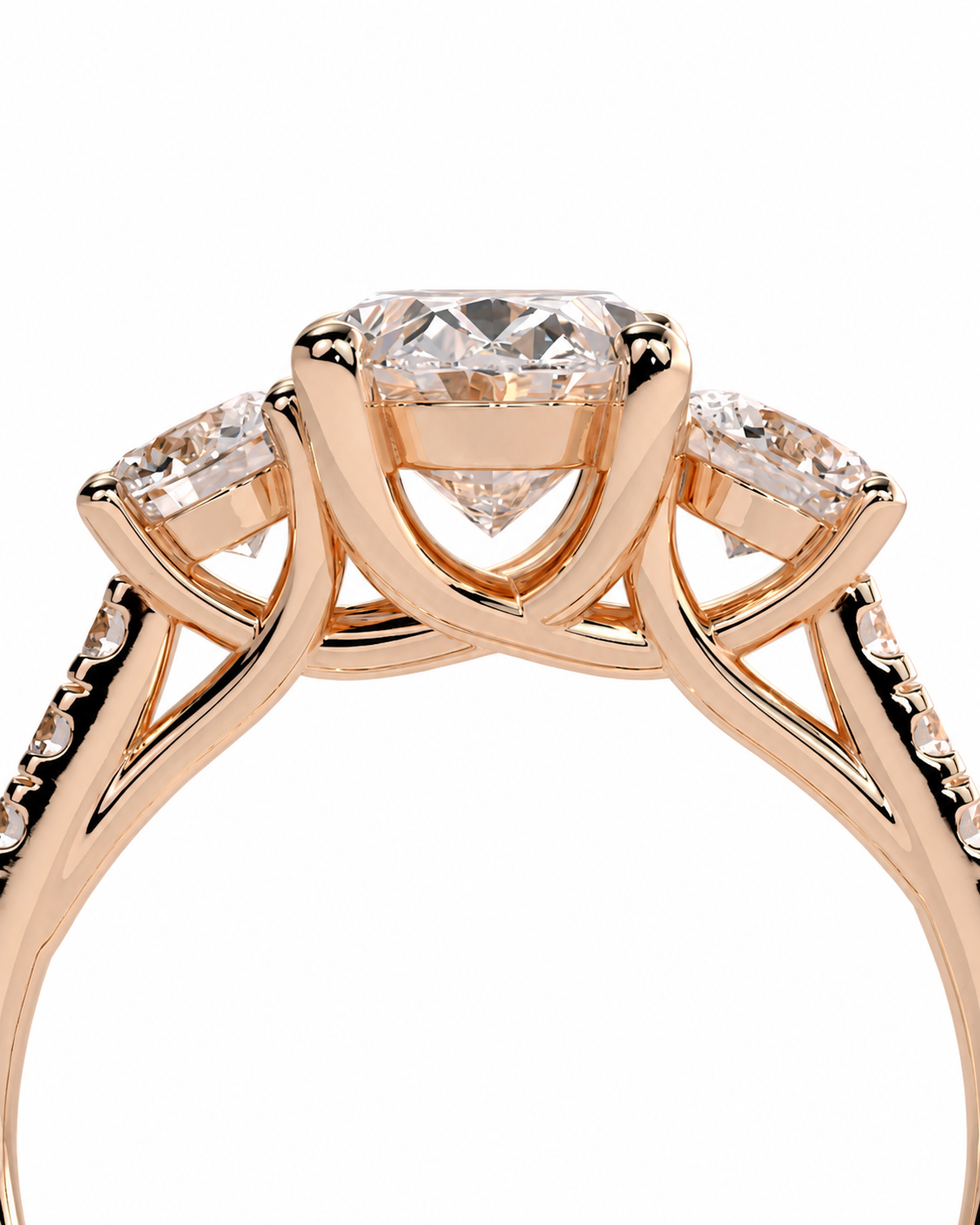 color_10K_RG, color_14K_RG &&Rose gold diamond engagement ring with a cushion-cut center stone and smaller side stones, shown in a close-up studio shot on a white background.