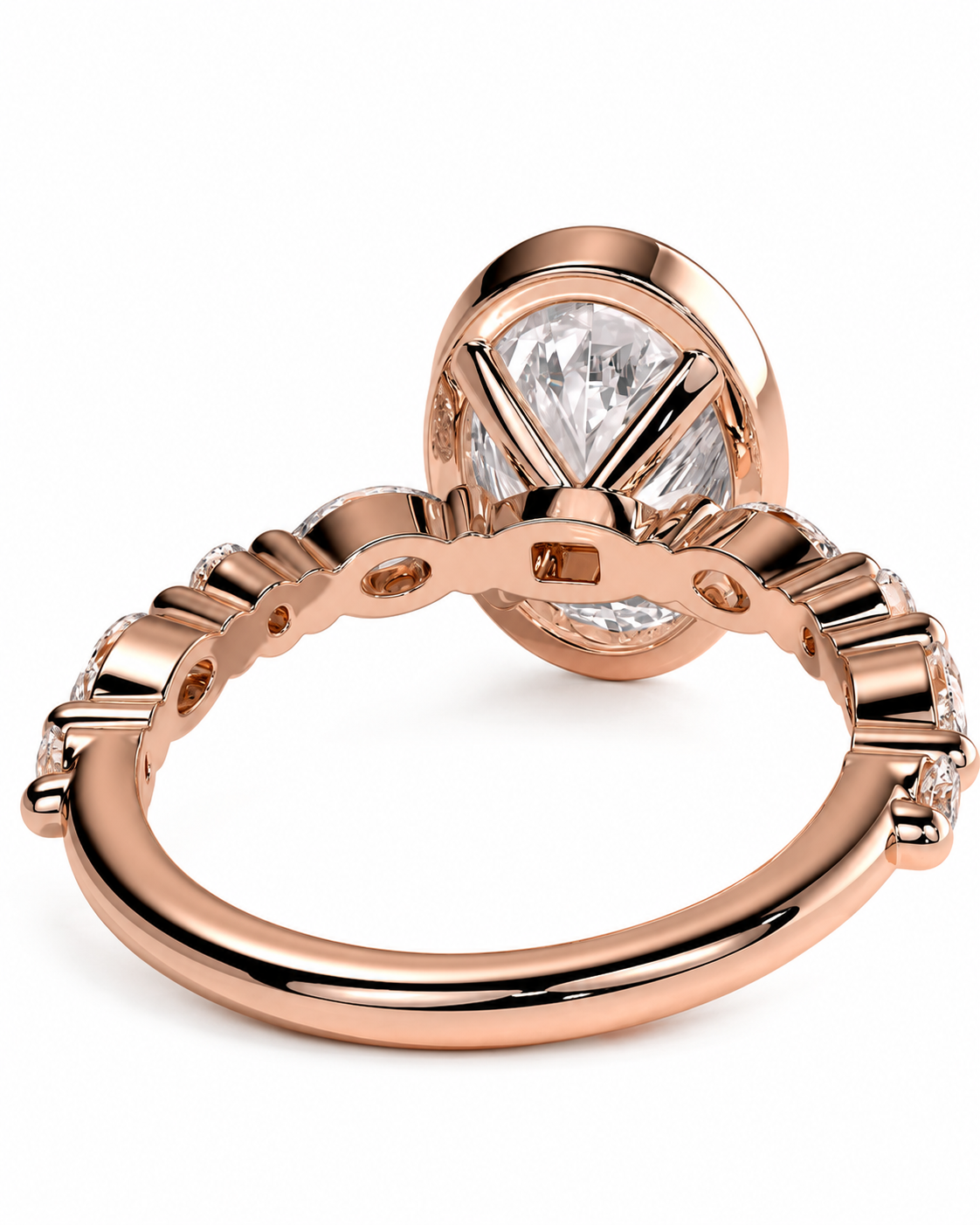 color_10K_RG, color_14K_RG &&Rose gold ring with a large oval clear gemstone in a prong setting, featuring a decorative beaded band with small accent stones, shown on a white background.