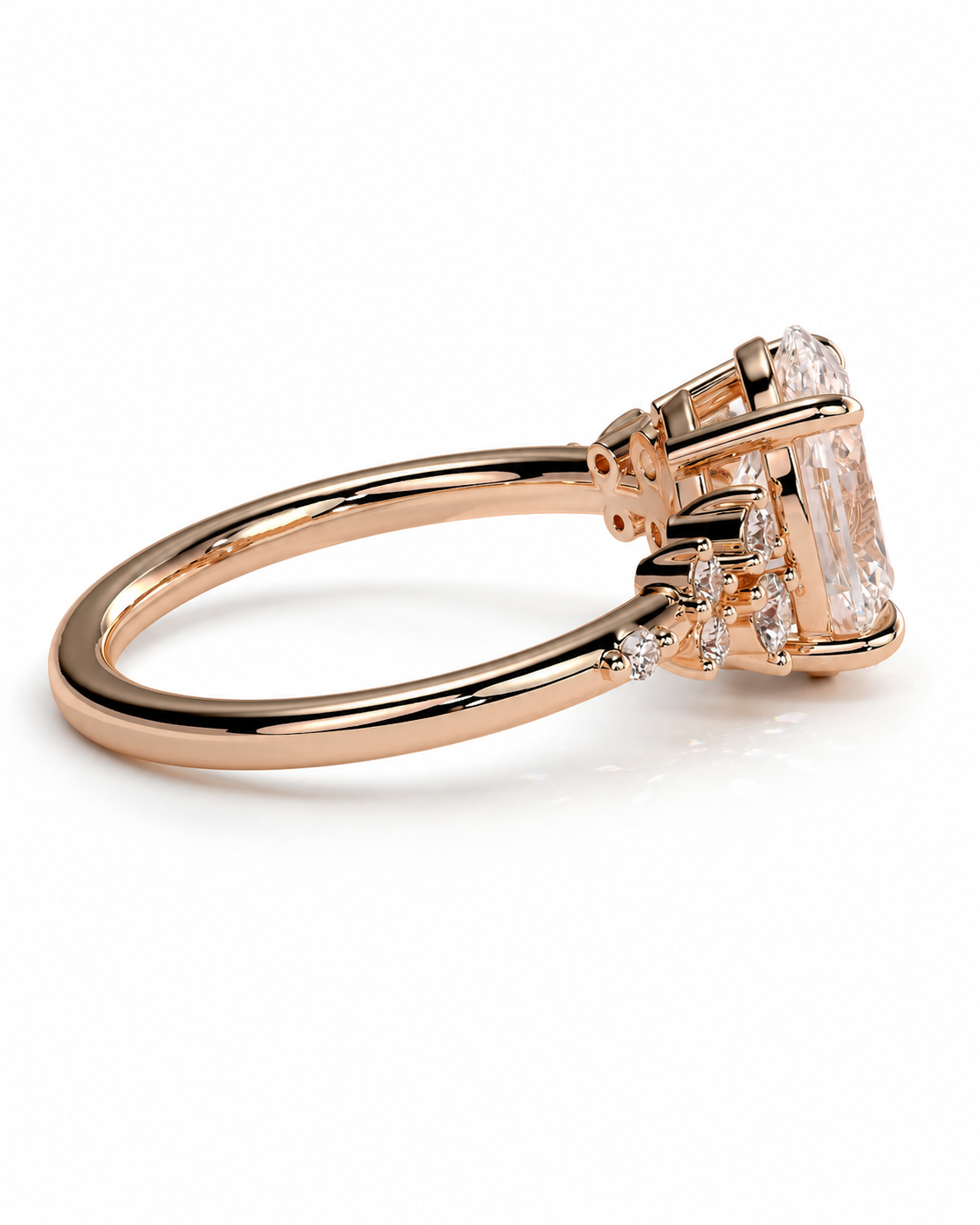 color_10K_RG, color_14K_RG &&A rose gold ring featuring a large rectangular clear gemstone in a prong setting, with smaller accent diamonds along the band, shown on a clean white background.