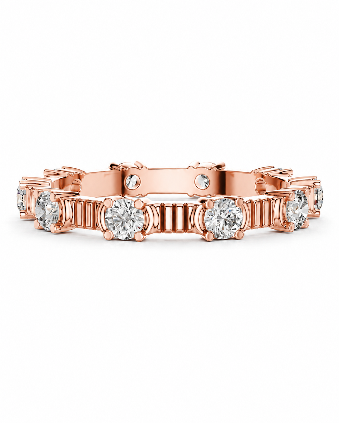 color_10K_RG, color_14K_RG &&	A rose gold eternity bracelet featuring round-cut clear gemstones in a prong setting and a polished baroque-style center stone, displayed on a clean white background.