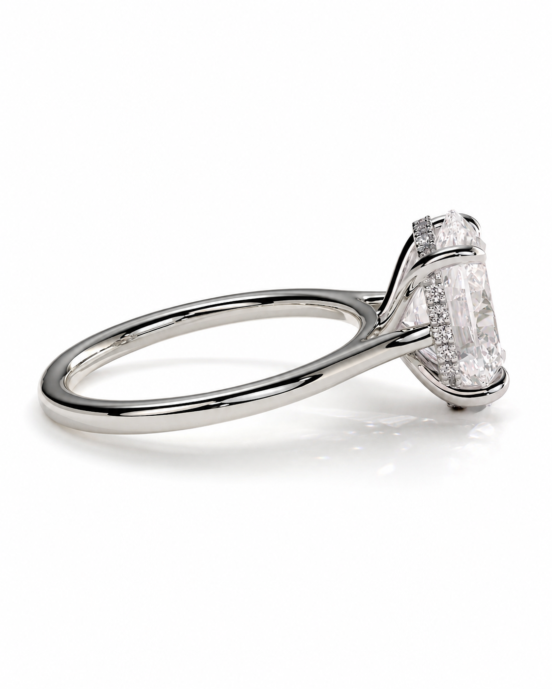 color_925_SIL,color_935_ARG,color_10K_WG, color_14K_WG &&A yellow gold engagement ring featuring a large emerald-cut clear center stone with a halo of small round stones, shown on a light gray background.