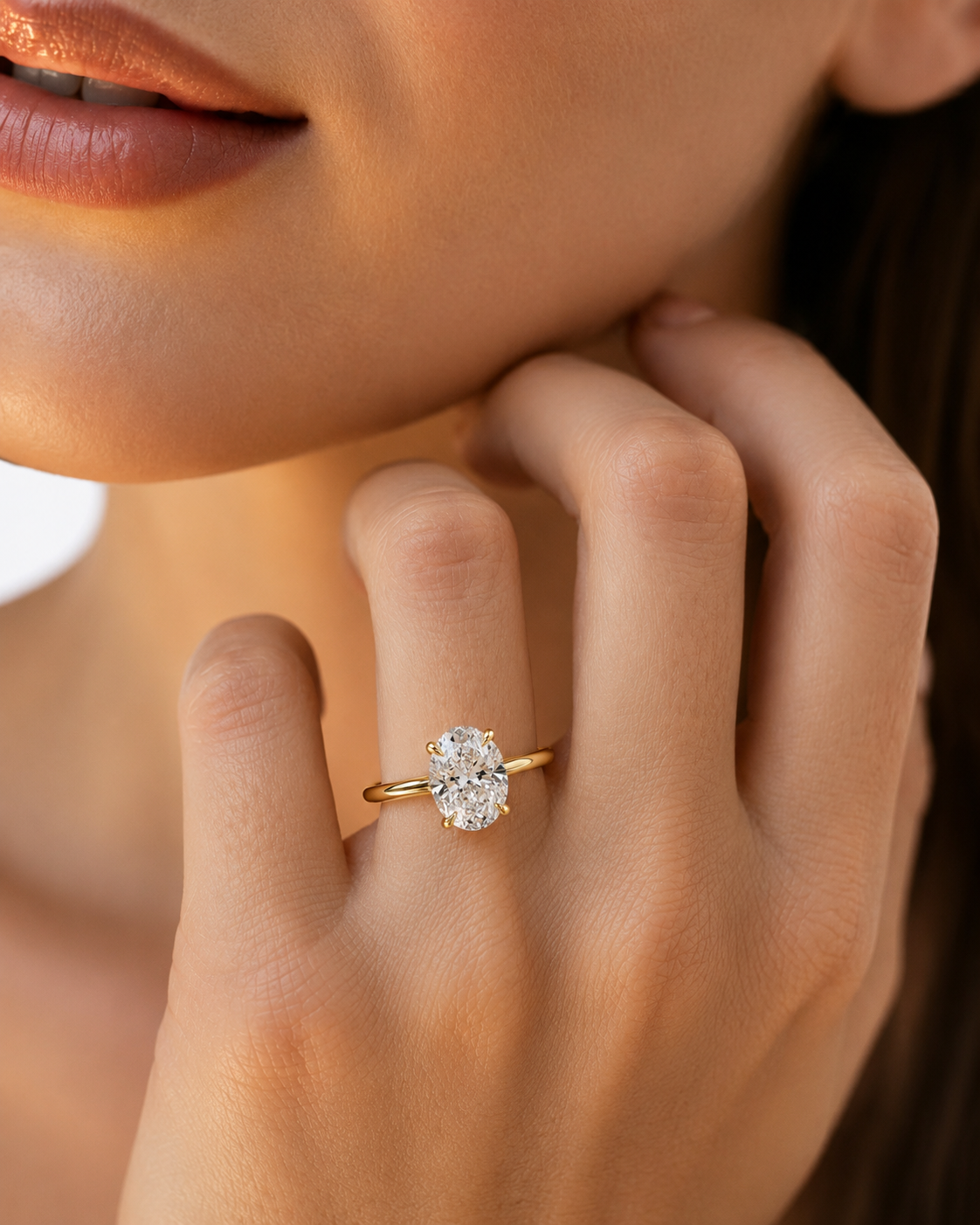 color_10K_YG, color_14K_YG &&Oval moissanite engagement ring with hidden halo front view
