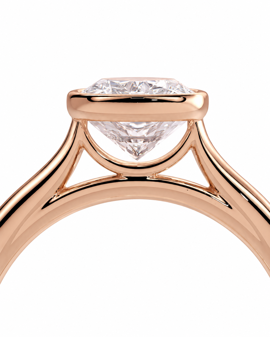 color_10K_RG, color_14K_RG &&Close-up of a rose gold solitaire engagement ring with a clear round-cut diamond, set against a plain white background.
