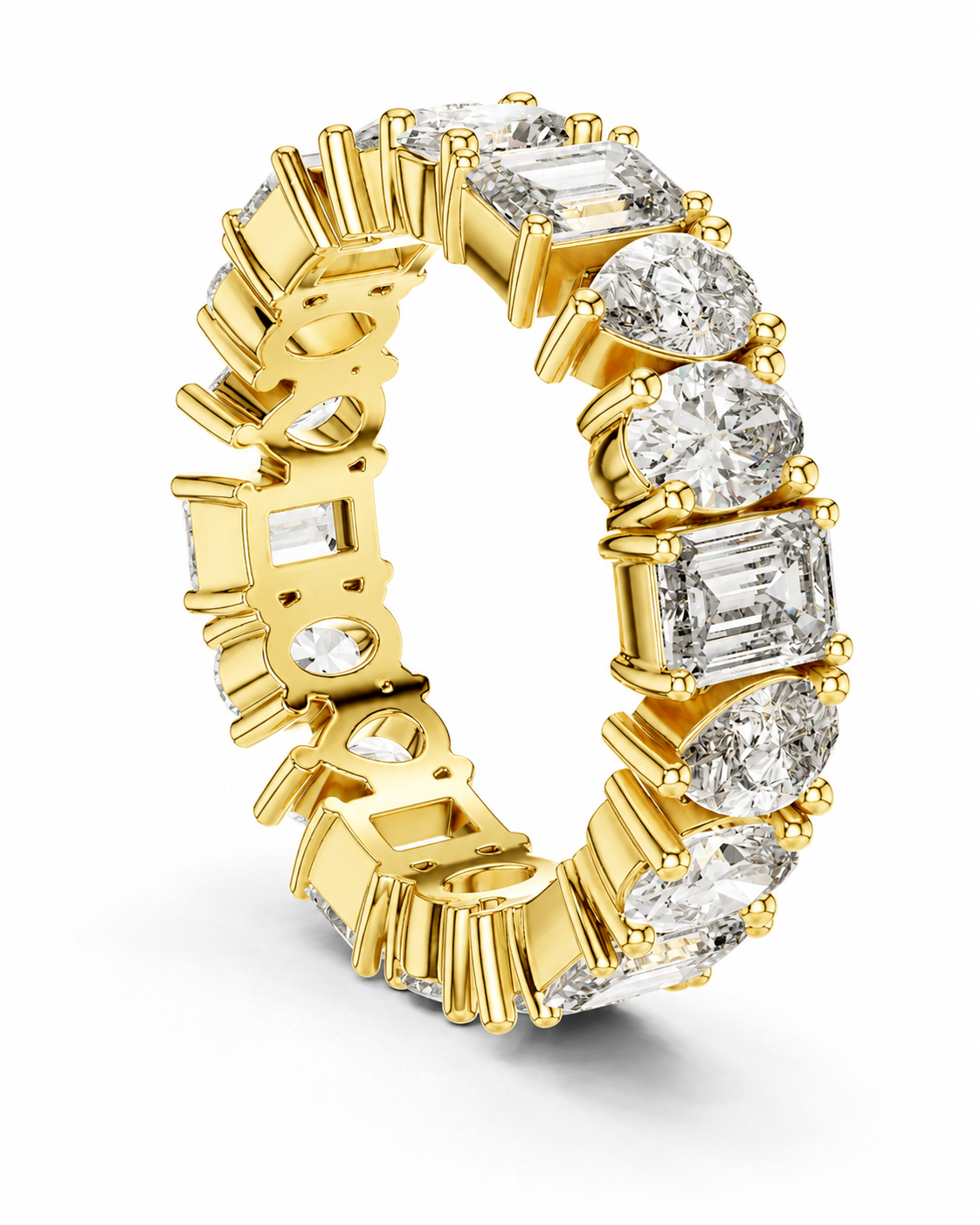 color_10K_YG, color_14K_YG &&	
A yellow gold eternity ring featuring a continuous row of clear gemstones in baguette, round, and oval settings, shown on a clean white background.