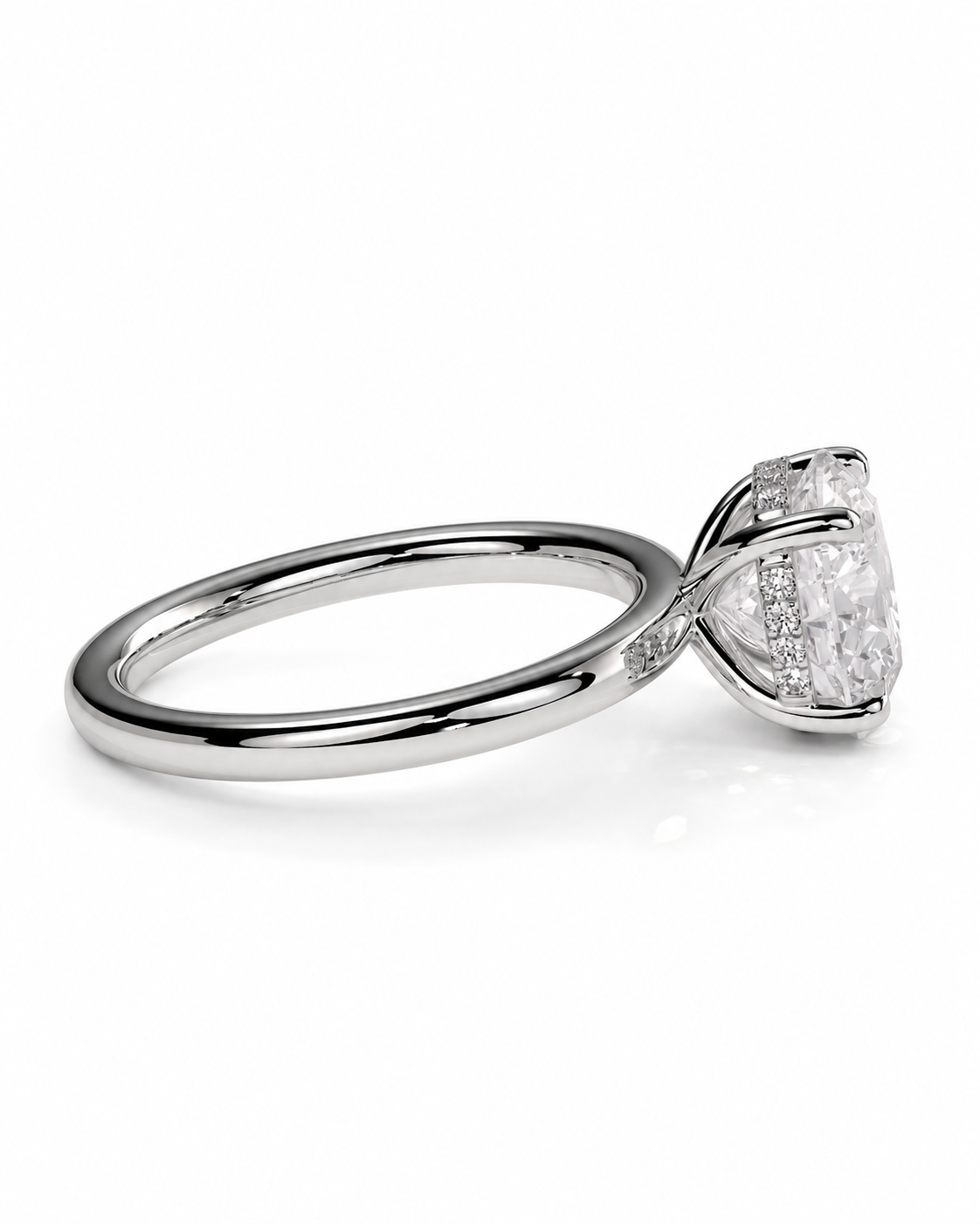color_925_SIL,color_935_ARG,color_10K_WG, color_14K_WG &&A yellow gold ring featuring a large oval-cut clear center stone and smaller side stones in a prong setting, shown on a clean white background.