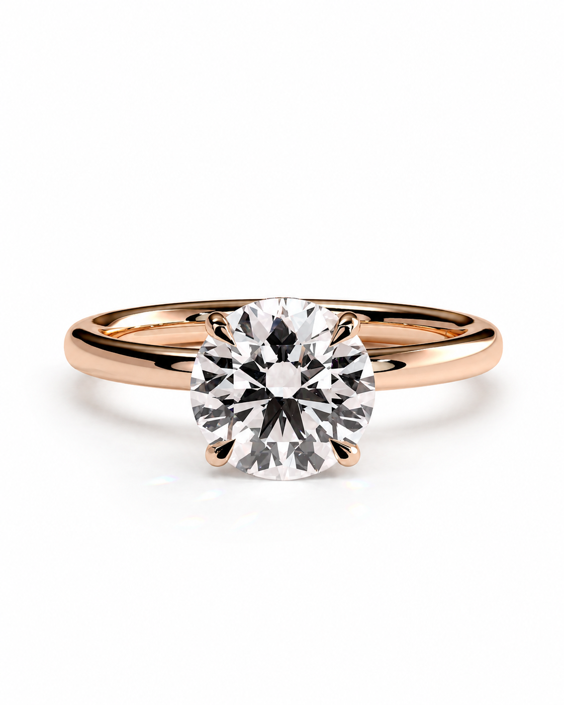 color_10K_RG, color_14K_RG &&A classic solitaire engagement ring featuring a round brilliant-cut diamond set in a rose gold four-prong band, shown on a clean white background.