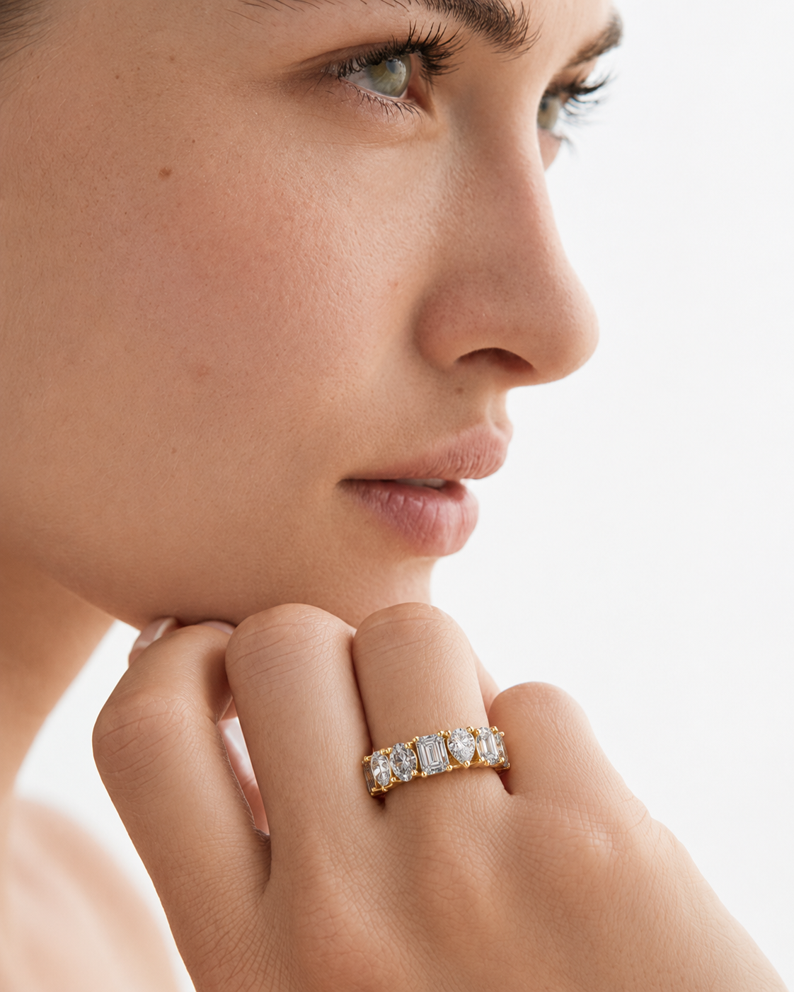 color_10K_YG, color_14K_YG &&	
Full eternity anniversary band with alternating mixed-cut moissanite stones and polished profile.