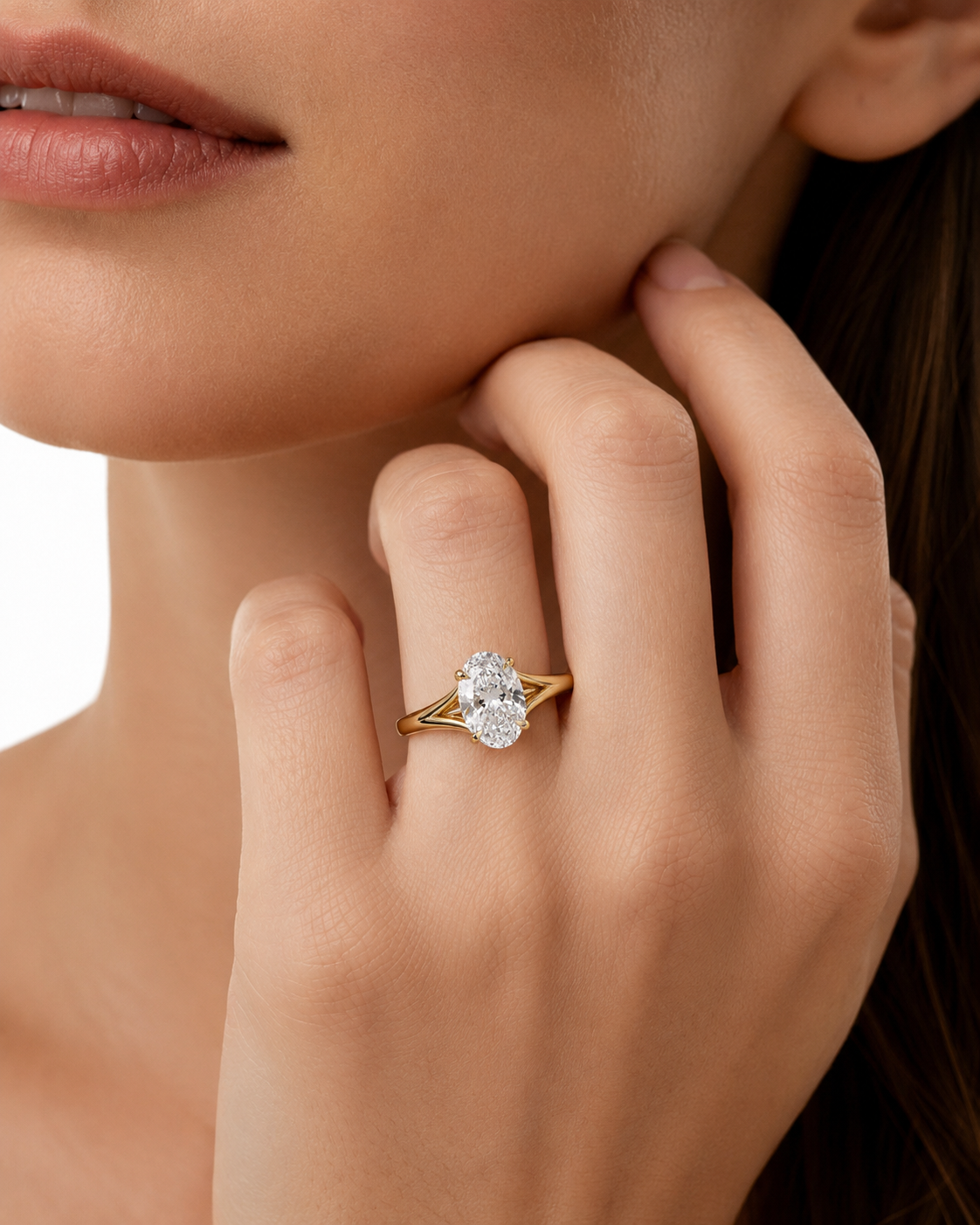 color_10K_YG, color_14K_YG &&Side view of oval moissanite engagement ring with open gallery
