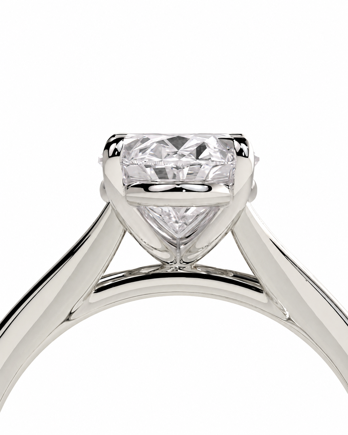 color_925_SIL,color_935_ARG,color_10K_WG, color_14K_WG &&A close-up studio shot of a solitaire engagement ring featuring a heart-shaped clear gemstone in a polished silver-colored metal setting, shown against a solid white background.