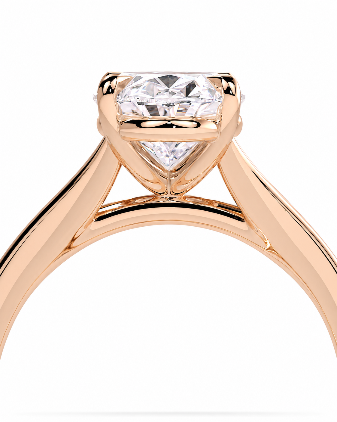 color_10K_RG, color_14K_RG &&A close-up of a rose gold solitaire engagement ring featuring a heart-shaped clear gemstone in a four-prong setting, shown against a solid white background.