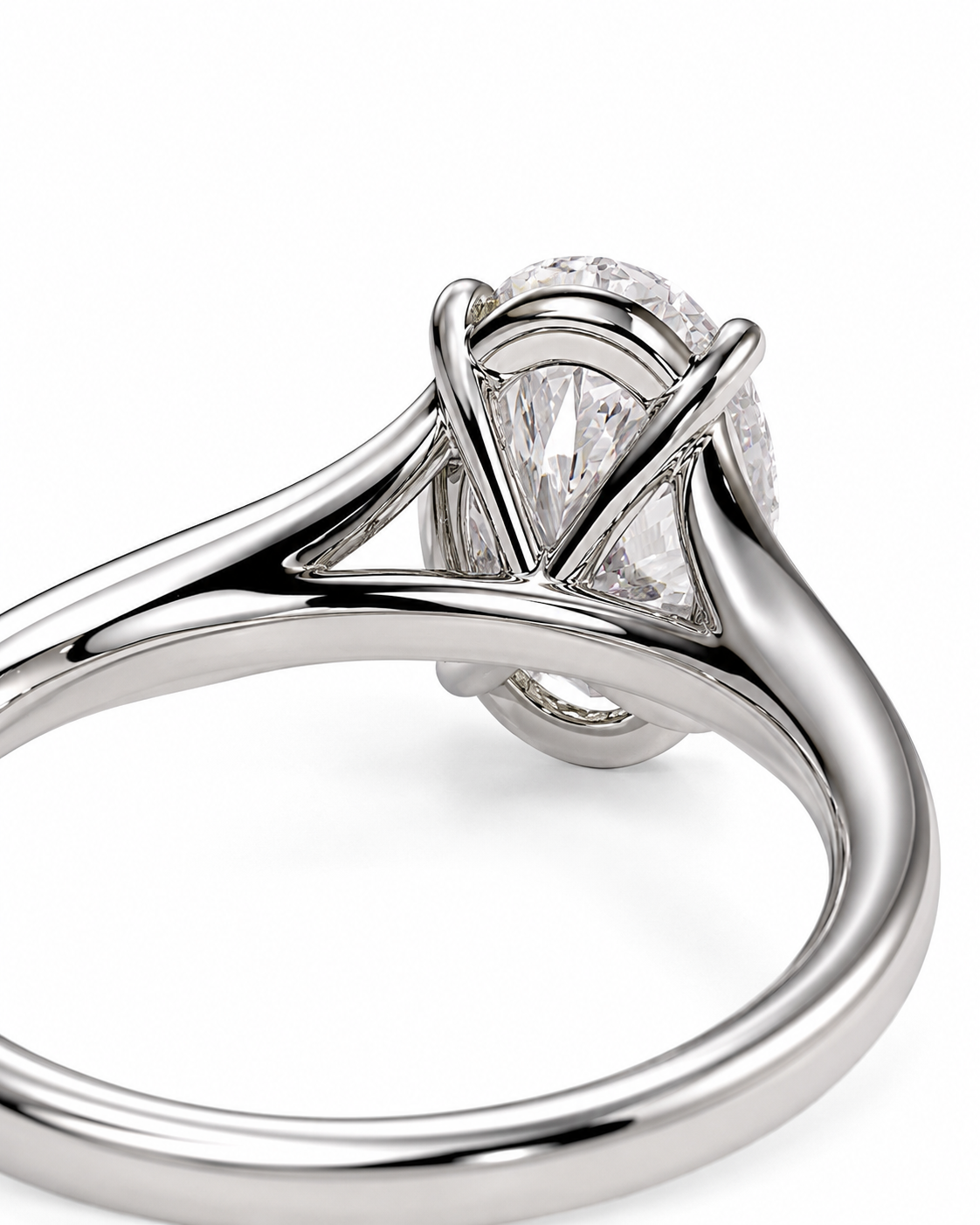 color_925_SIL,color_935_ARG,color_10K_WG, color_14K_WG &&Close-up of a silver-toned diamond ring with a pear-cut center stone in a four-prong setting, shown on a white background.