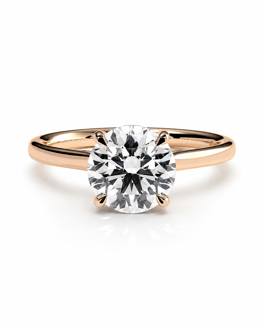 color_10K_RG, color_14K_RG &&A classic solitaire engagement ring featuring a round brilliant-cut diamond set in a polished rose gold band with a four-prong setting, shown on a clean white background.
