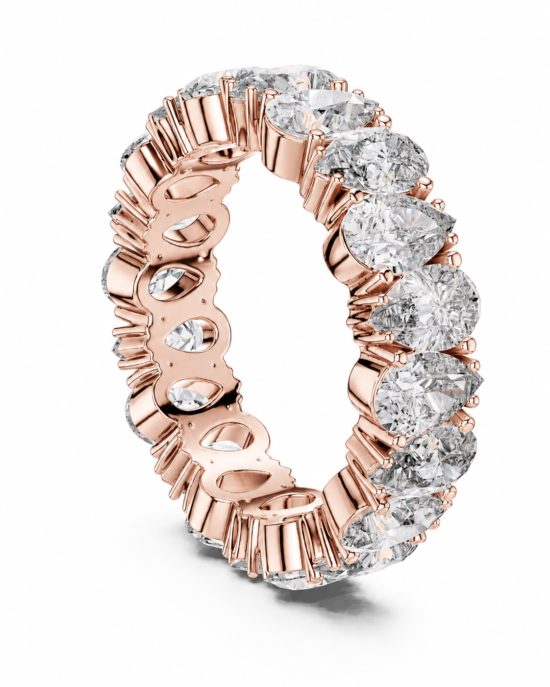 color_10K_RG, color_14K_RG &&	A rose gold eternity ring featuring a continuous row of clear round-cut and pear-cut gemstones on a white background.