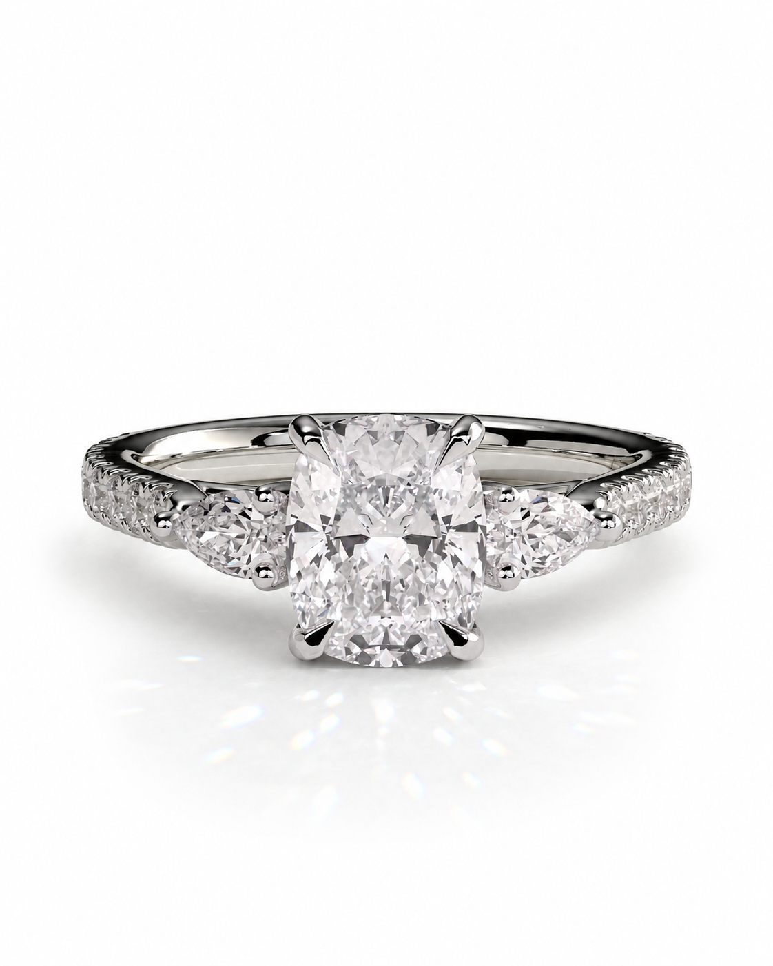 color_925_SIL,color_935_ARG,color_10K_WG, color_14K_WG &&A radiant cut diamond engagement ring with a brilliant center stone and smaller diamonds along the shoulders, set in a polished silver-colored metal on a white background.