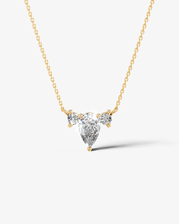 Pear Moissanite cluster pendant necklace featuring a pear-shaped center stone with two round accent stones in a front view.