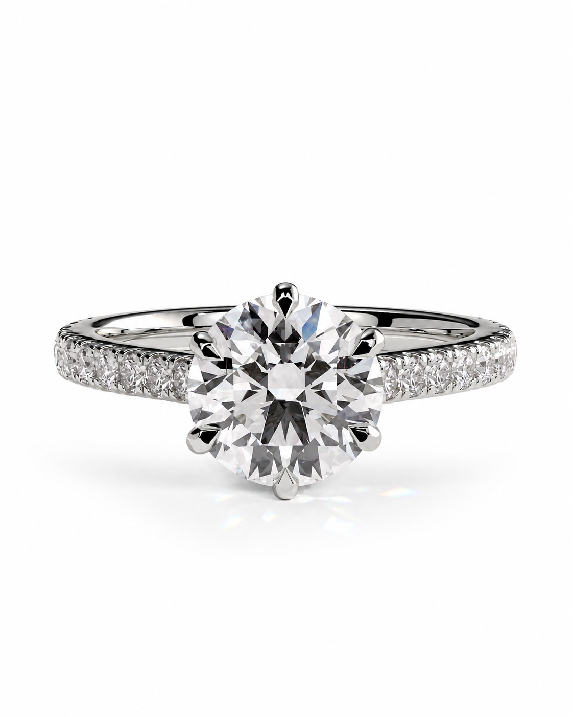 color_925_SIL,color_935_ARG,color_10K_WG, color_14K_WG &&A radiant cluster diamond ring featuring a large round-cut center stone in a prong setting, with a pave band set with small diamonds, shown on a clean white background.