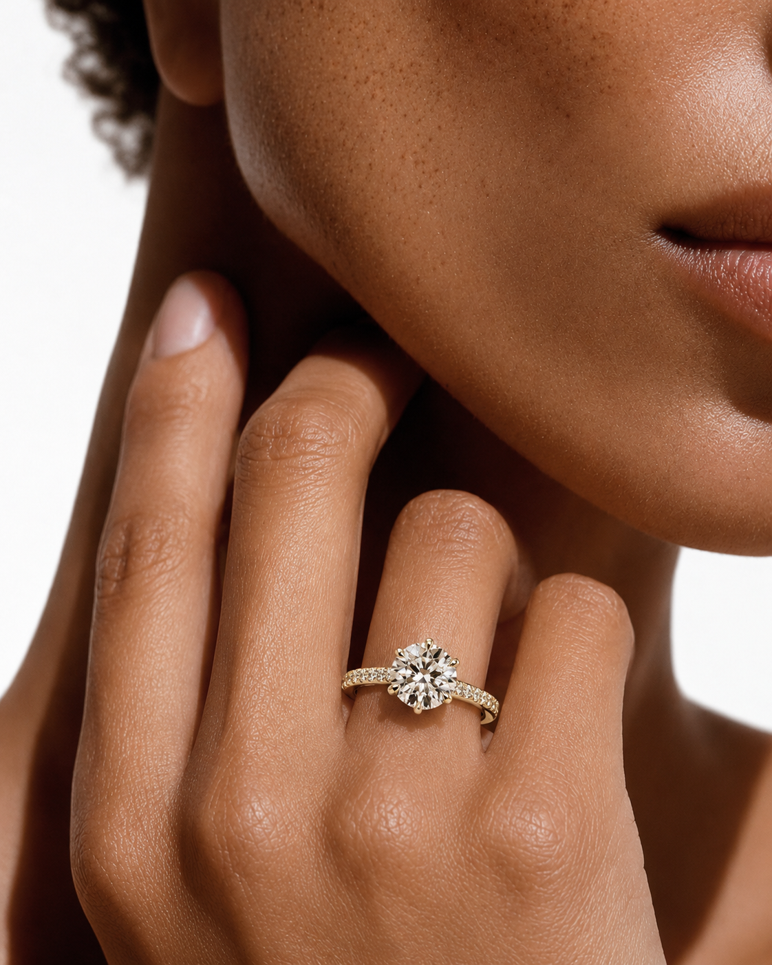 color_10K_YG, color_14K_YG &&Round moissanite engagement ring with delicate pave band front view
