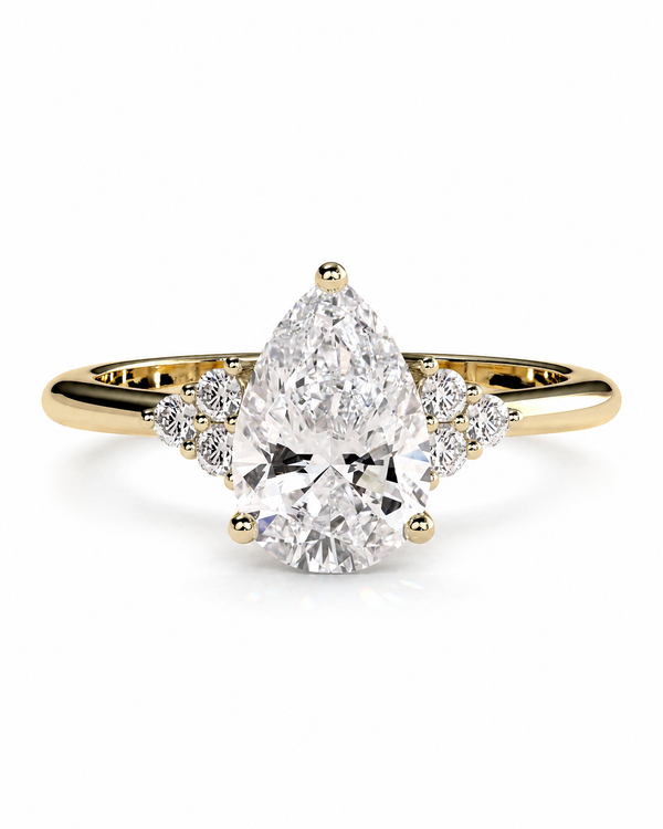 color_10K_YG, color_14K_YG &&Pear moissanite engagement ring with round cluster side stones in front view.

