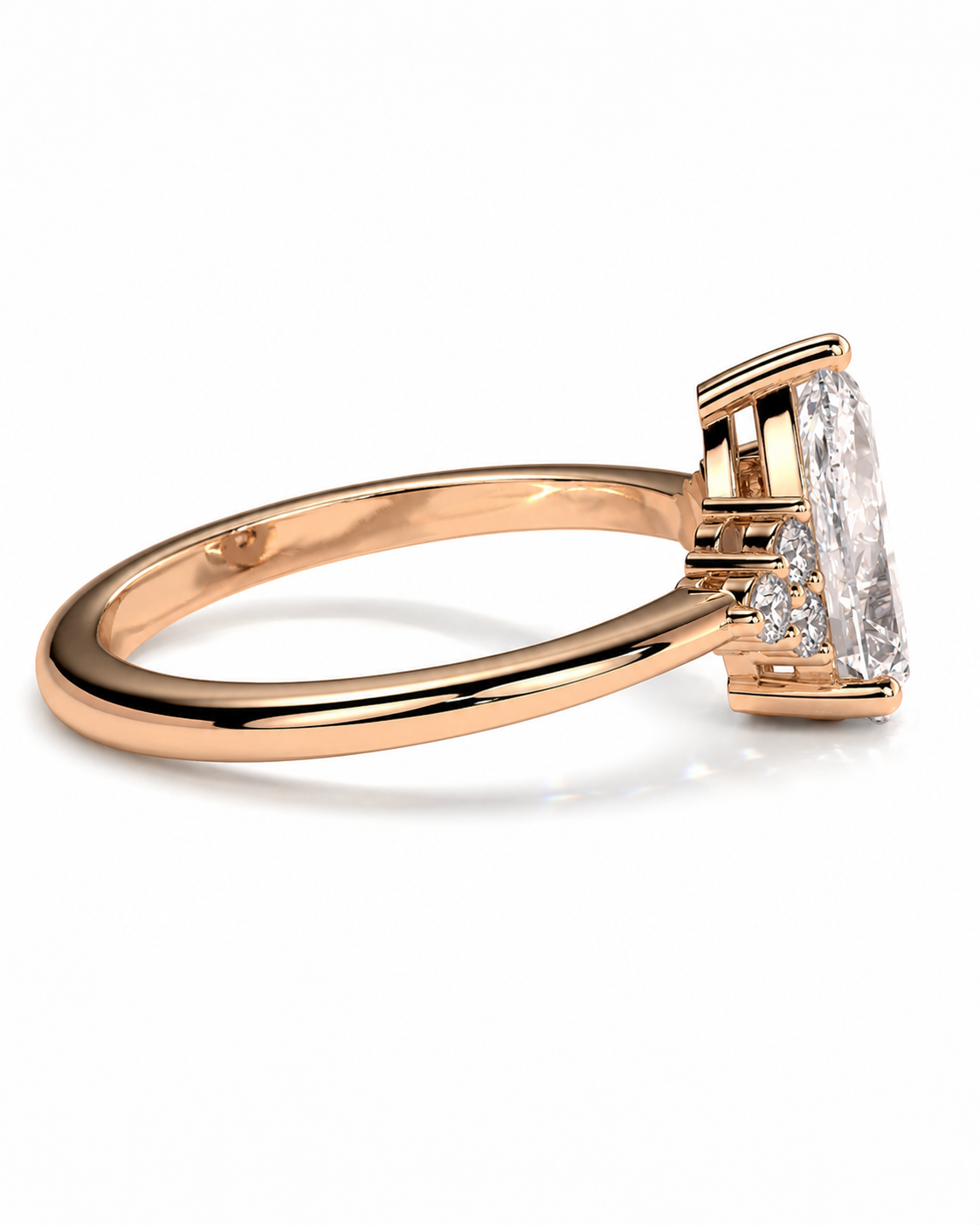 color_10K_RG, color_14K_RG &&A rose gold ring with a large emerald-cut diamond center stone and smaller diamonds on the shoulders, shown in a three-quarter view on a white background.